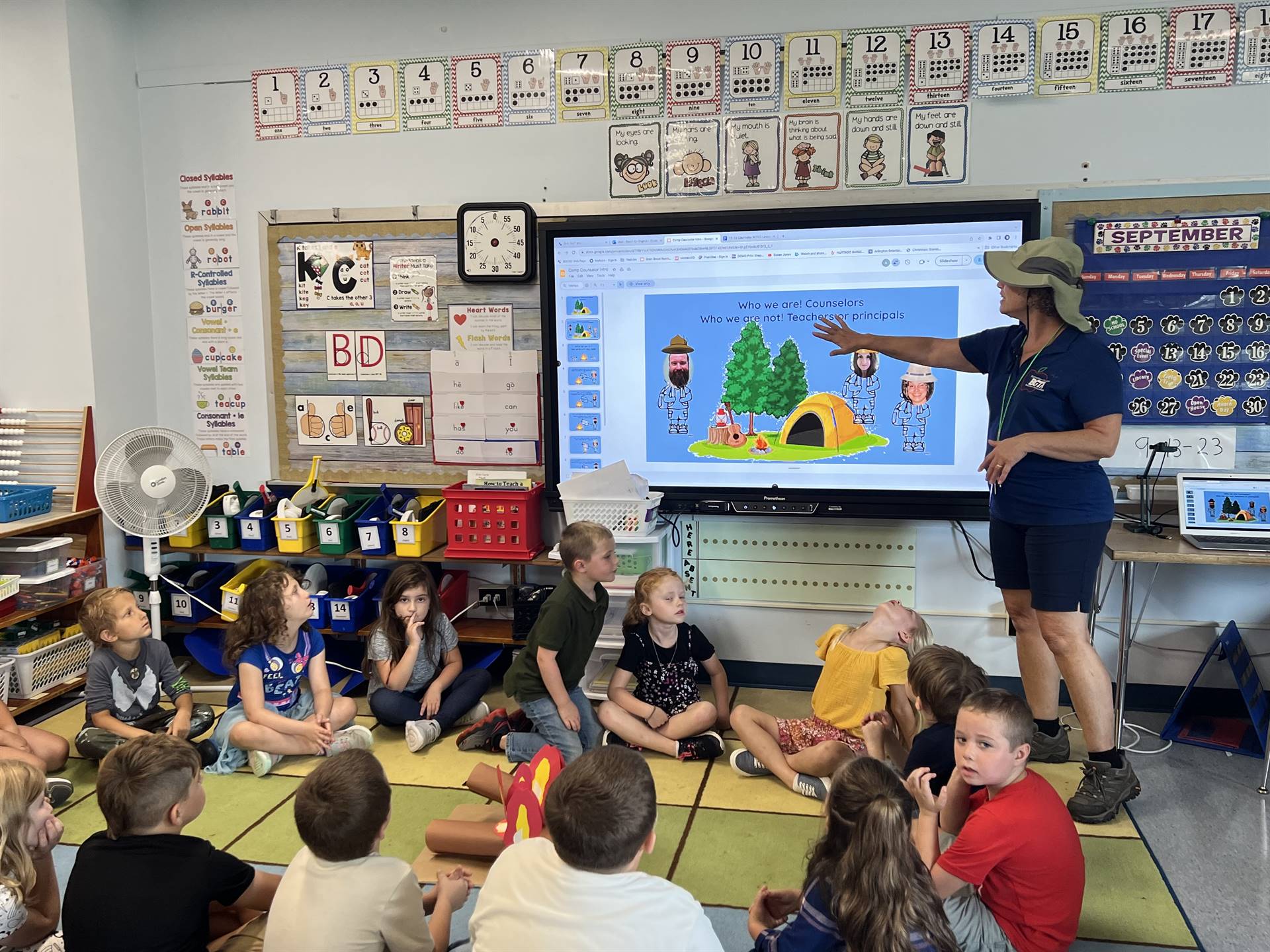 students looking at smart board 