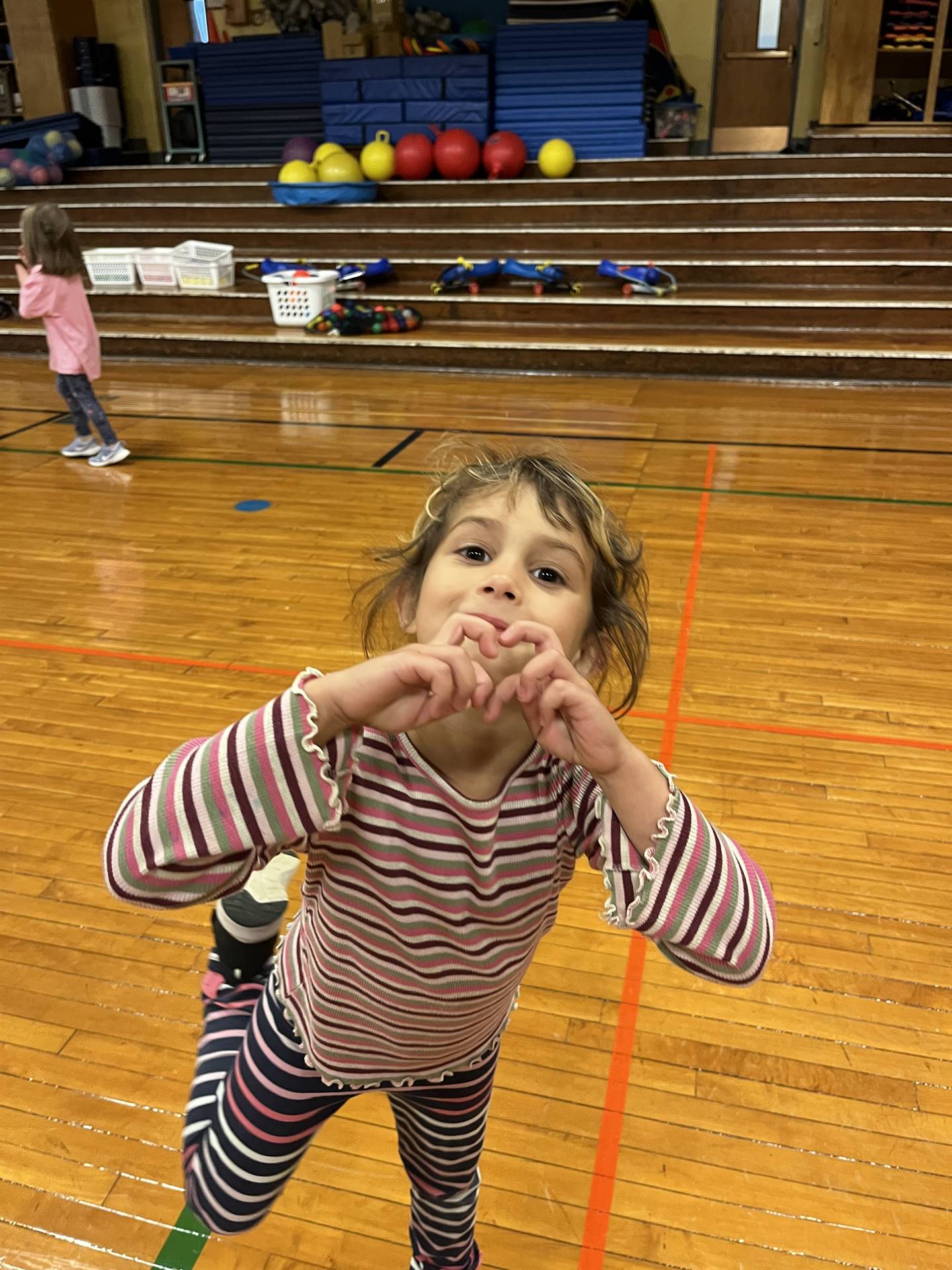 heart hug with hands.