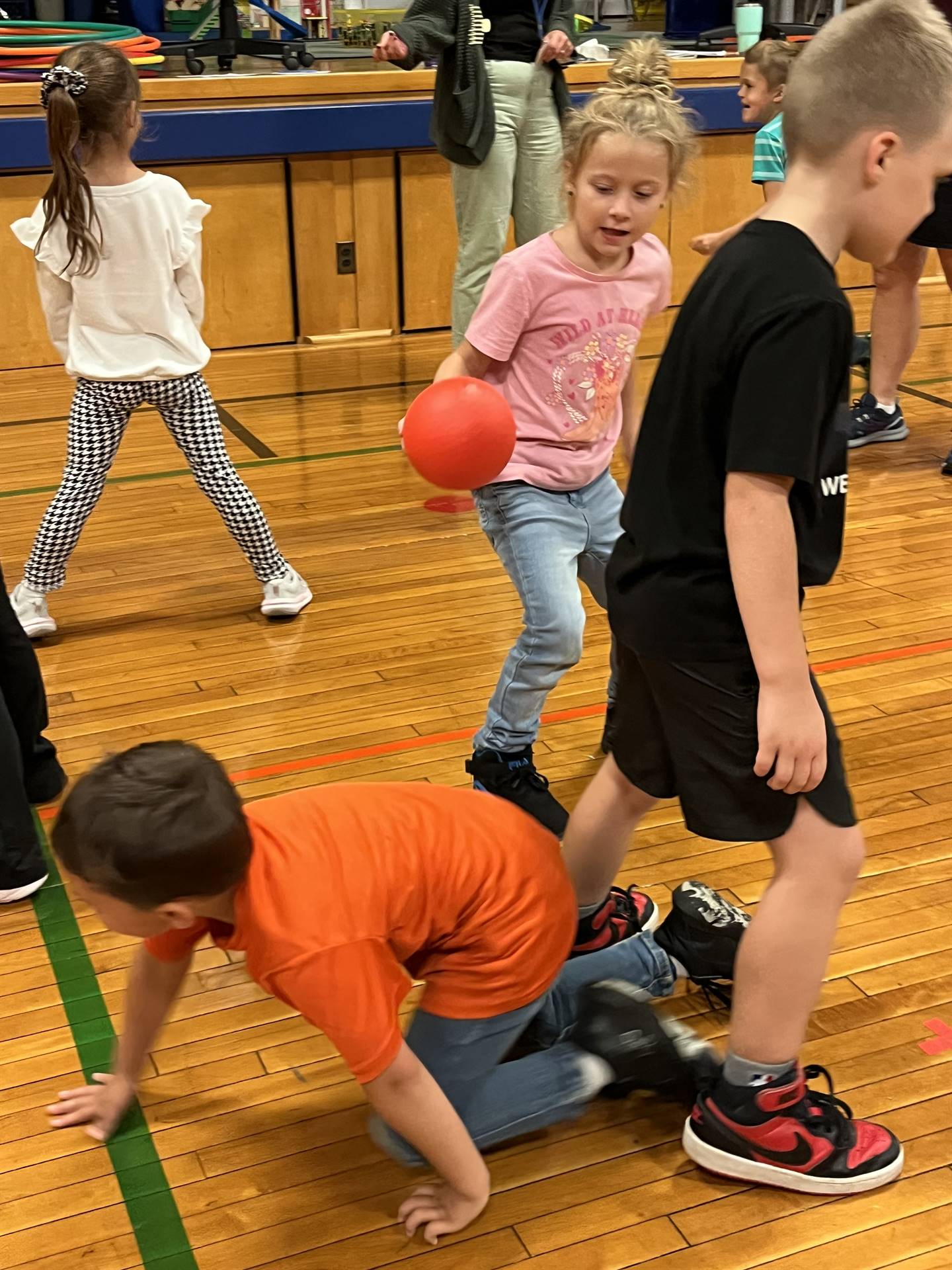 Tag games and student crawls under another student