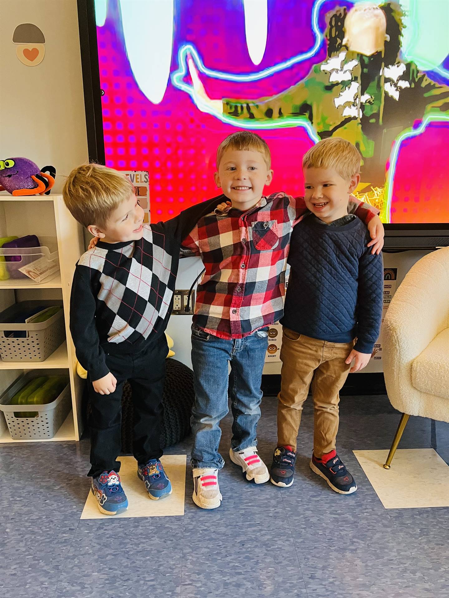 3 kids dressed up and dancing