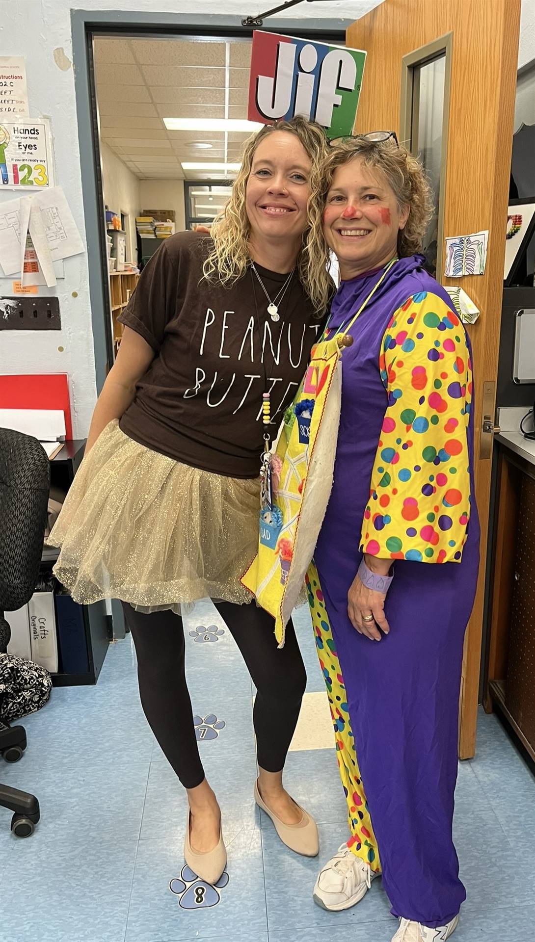 2 adults dressed in costumes 