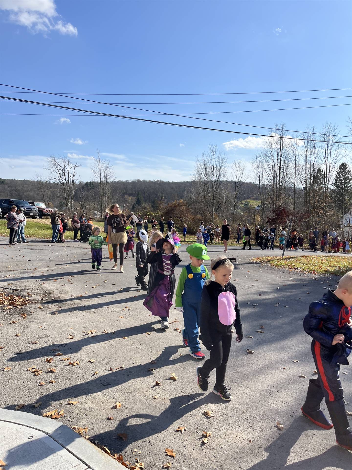 students marching in halloween parade outdoors!