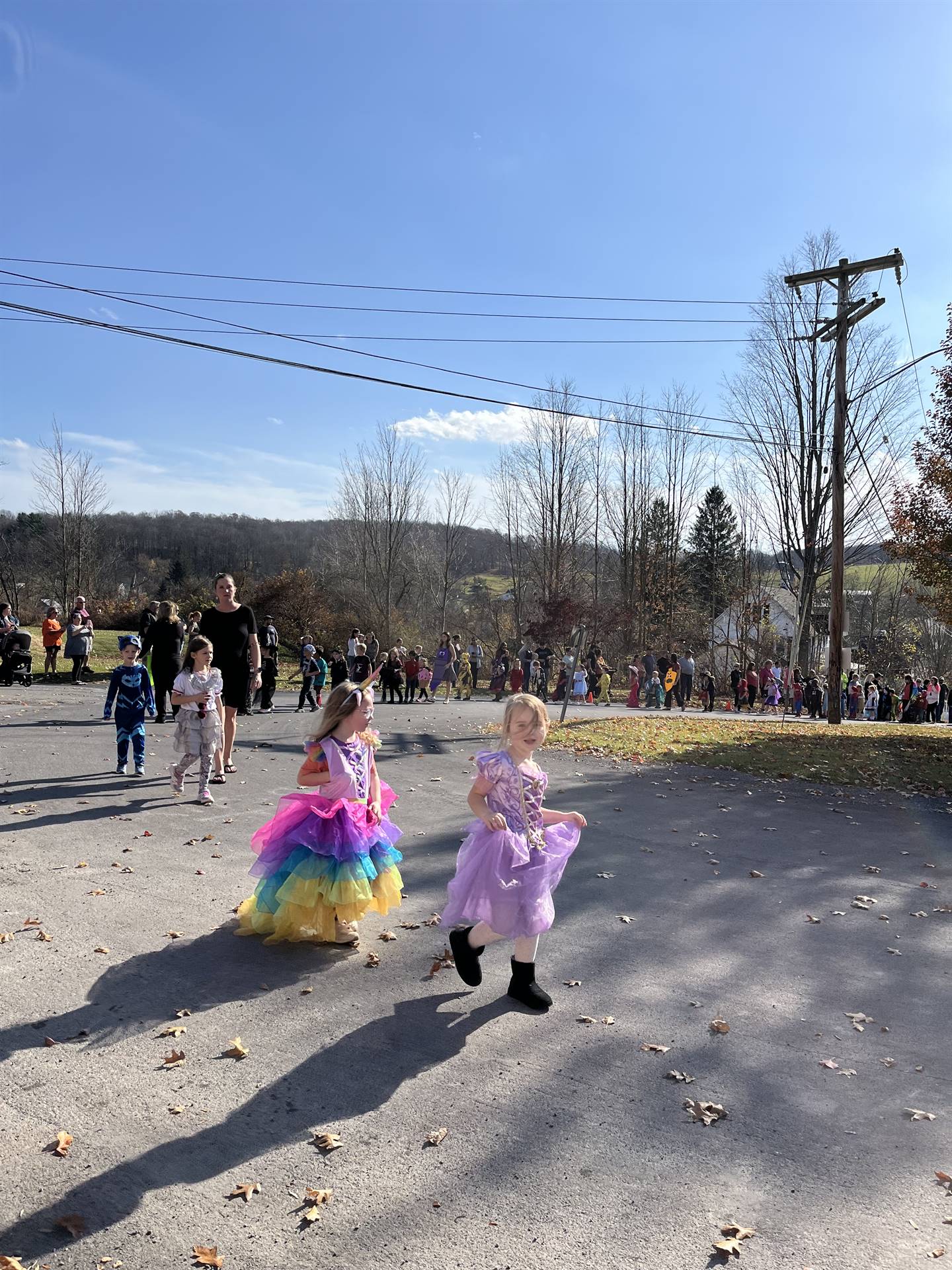 students marching in halloween parade outdoors!