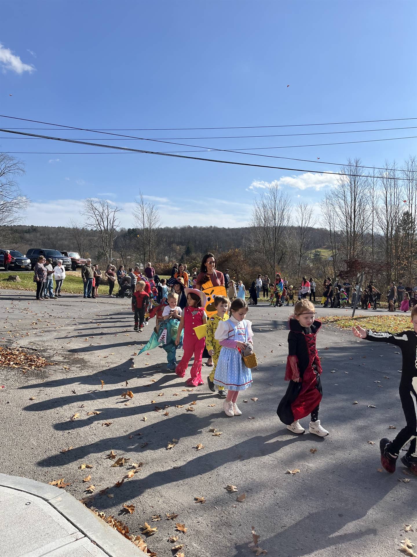 students marching in halloween parade outdoors!