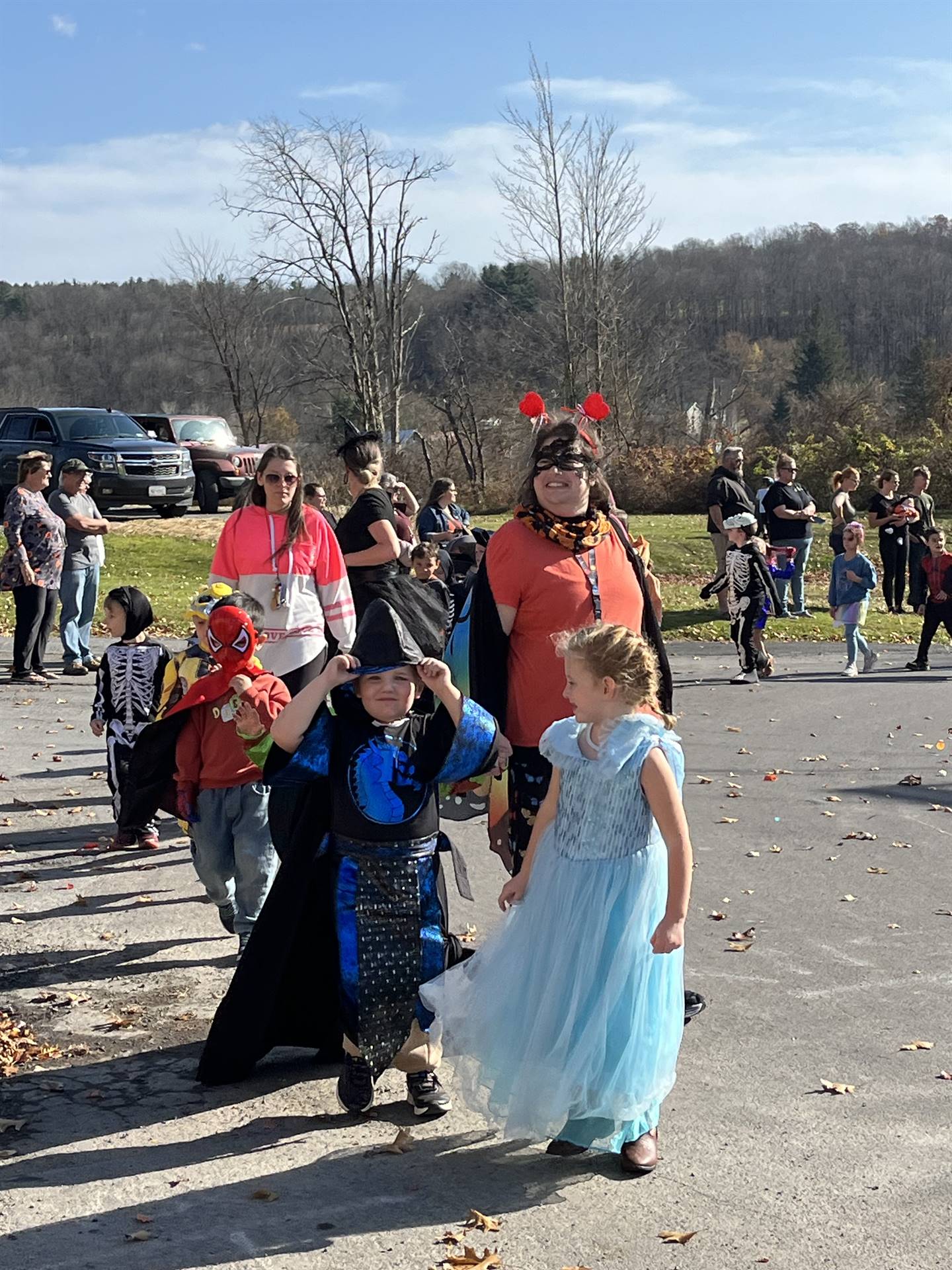 students marching in halloween parade outdoors!