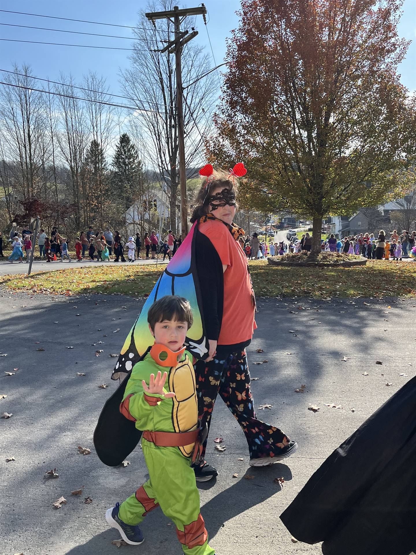 students marching in halloween parade outdoors!
