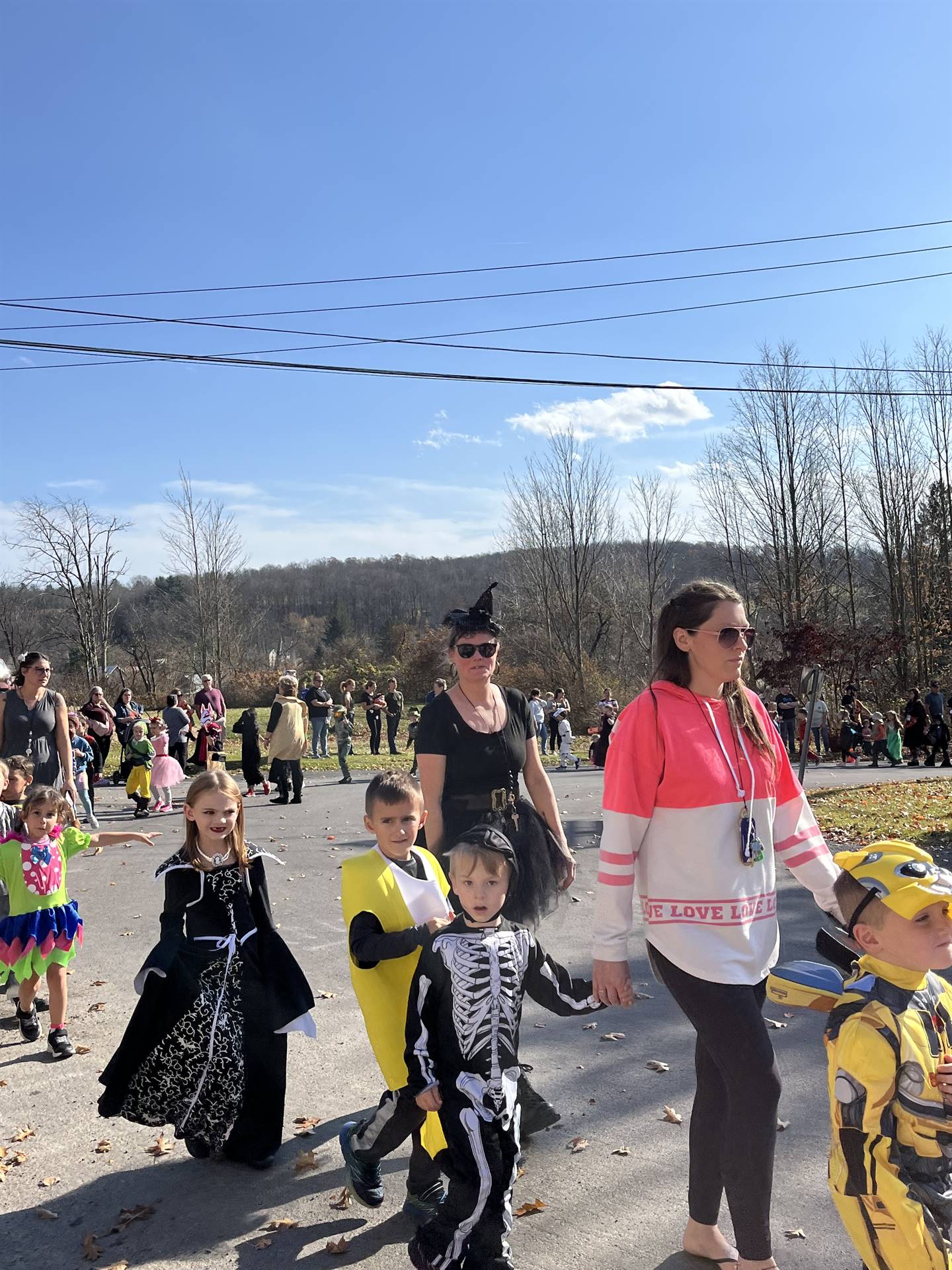 students marching in halloween parade outdoors!