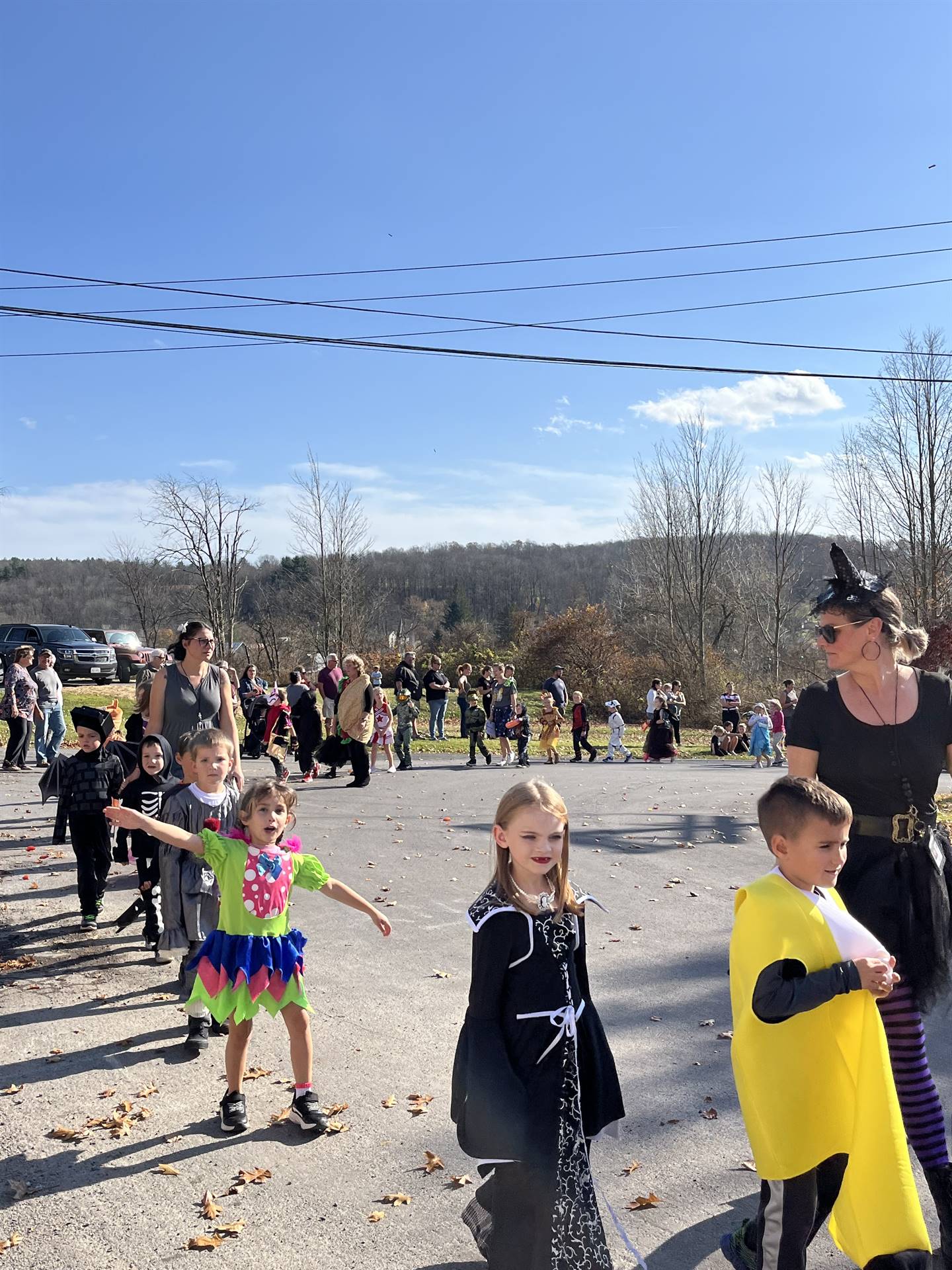 students marching in halloween parade outdoors!