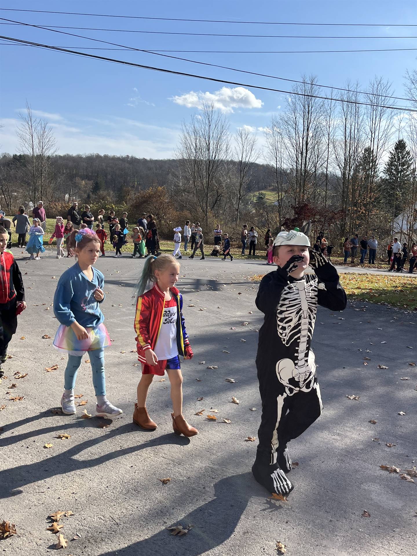 students marching in halloween parade outdoors!
