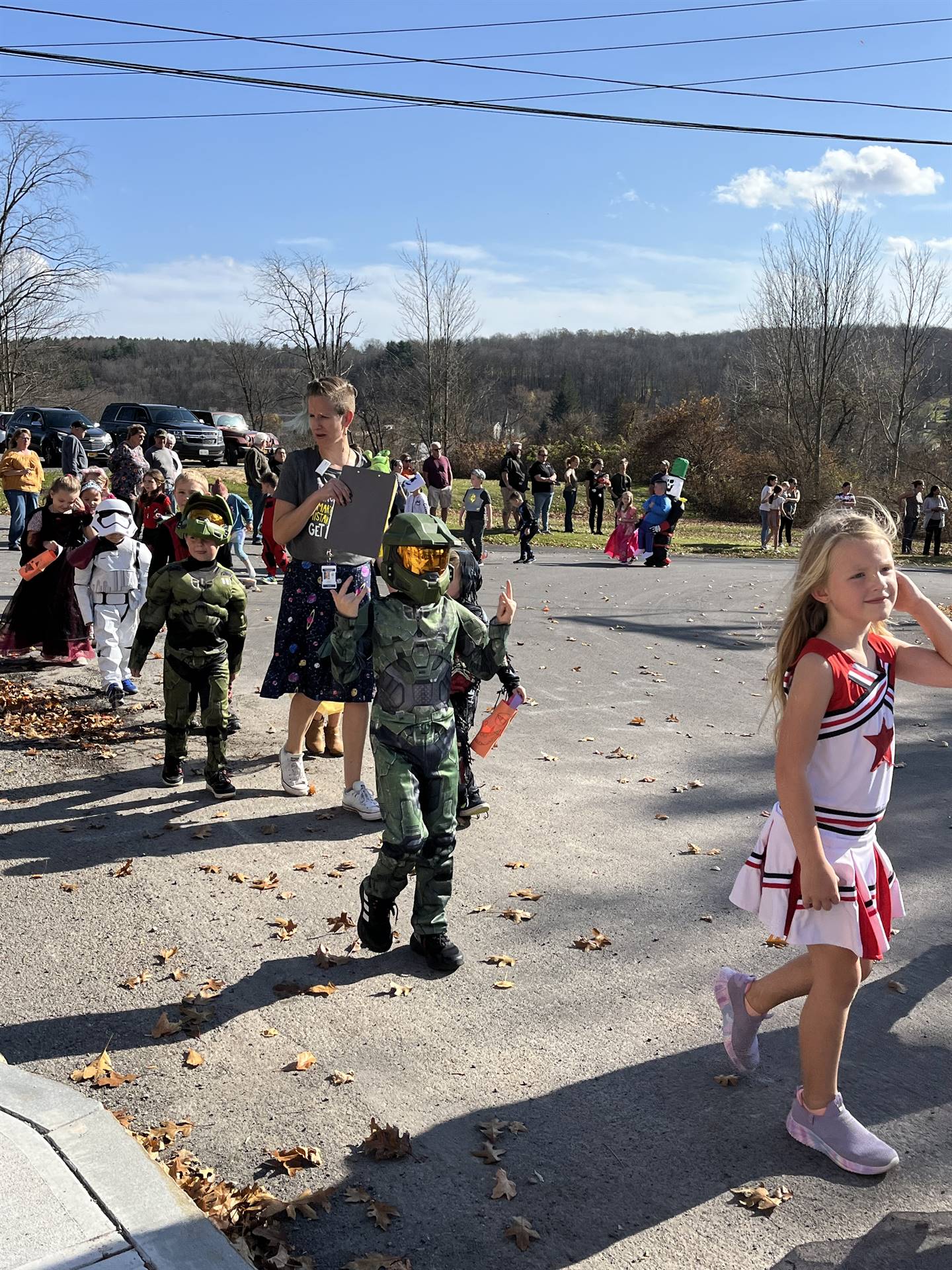 students marching in halloween parade outdoors!
