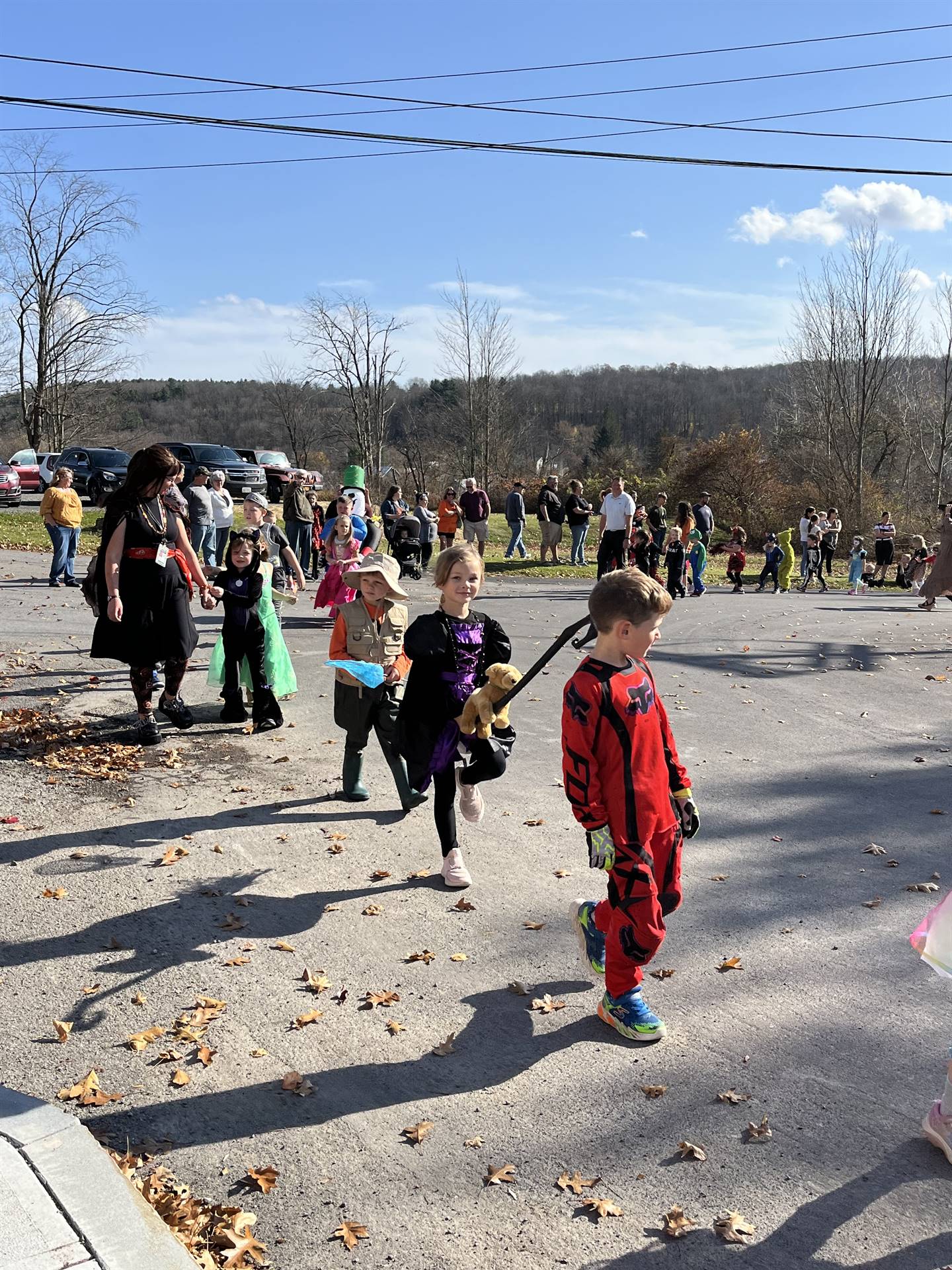 students marching in halloween parade outdoors!