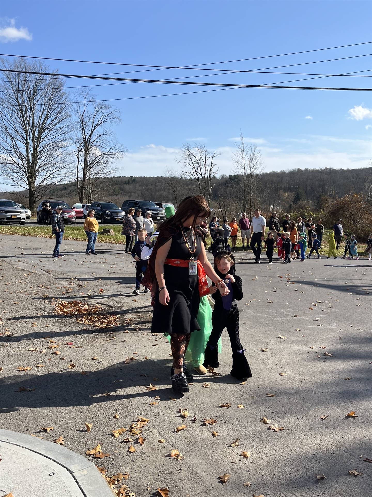 students marching in halloween parade outdoors!