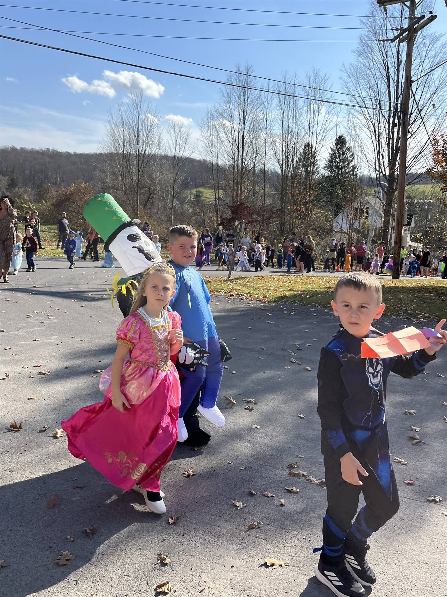 students marching in halloween parade outdoors!