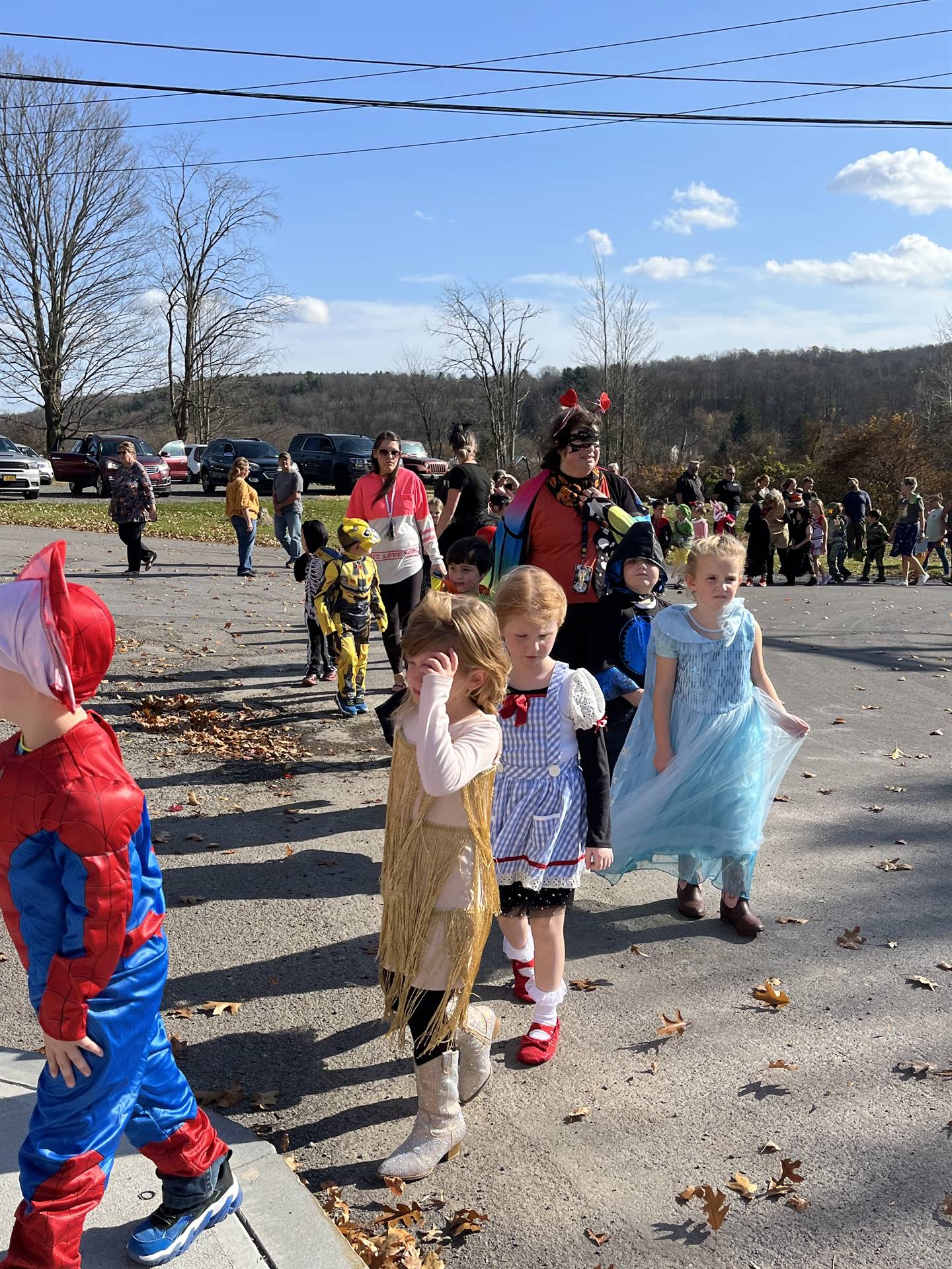 students marching in halloween parade outdoors!