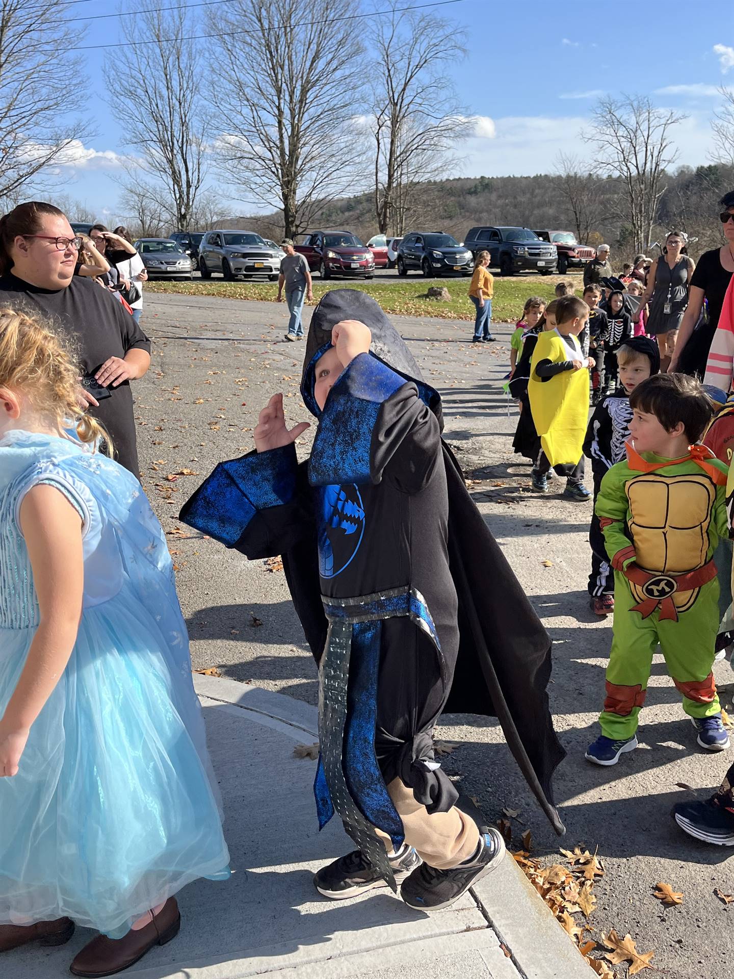 students marching in halloween parade outdoors!