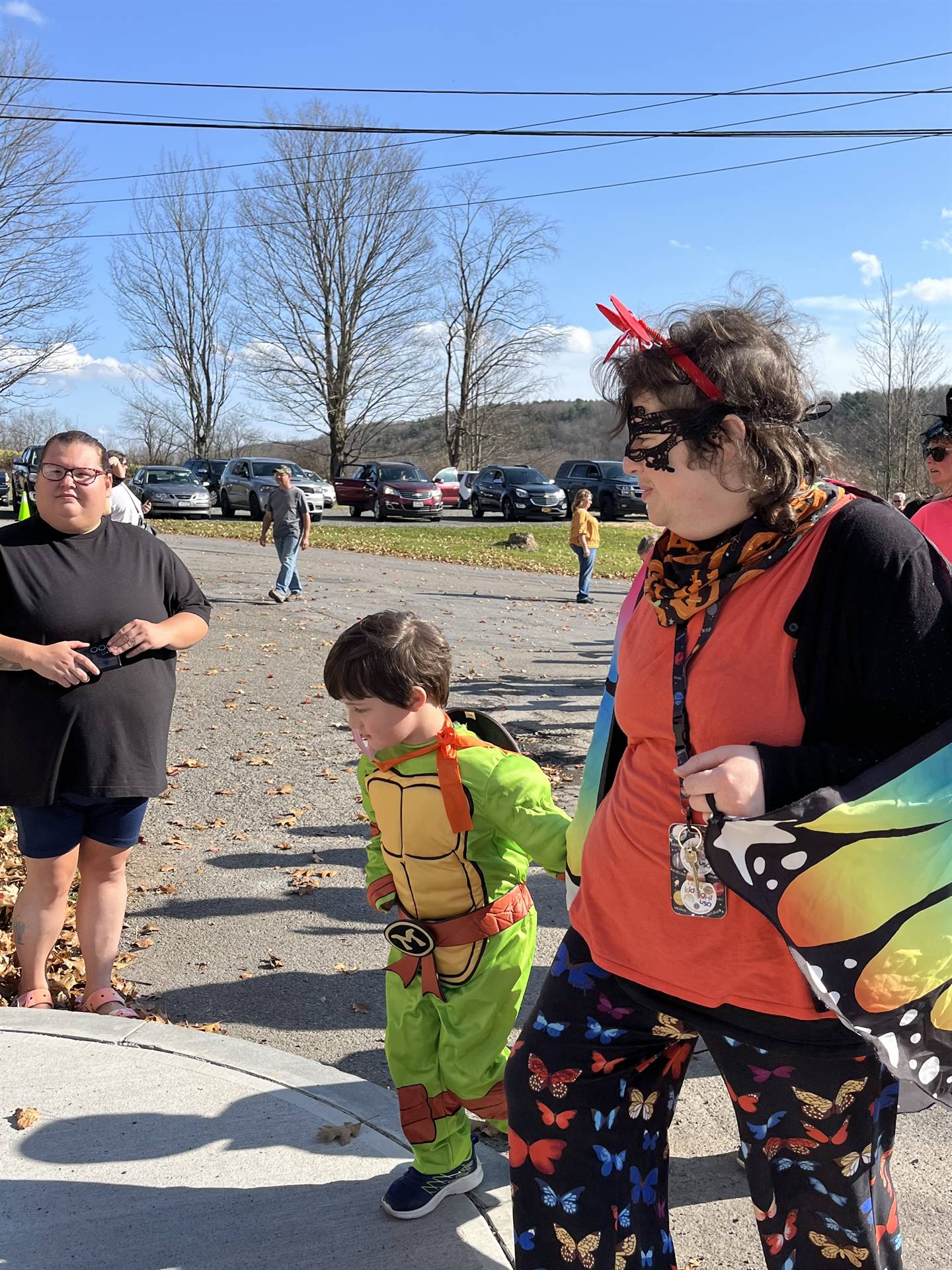 students marching in halloween parade outdoors!