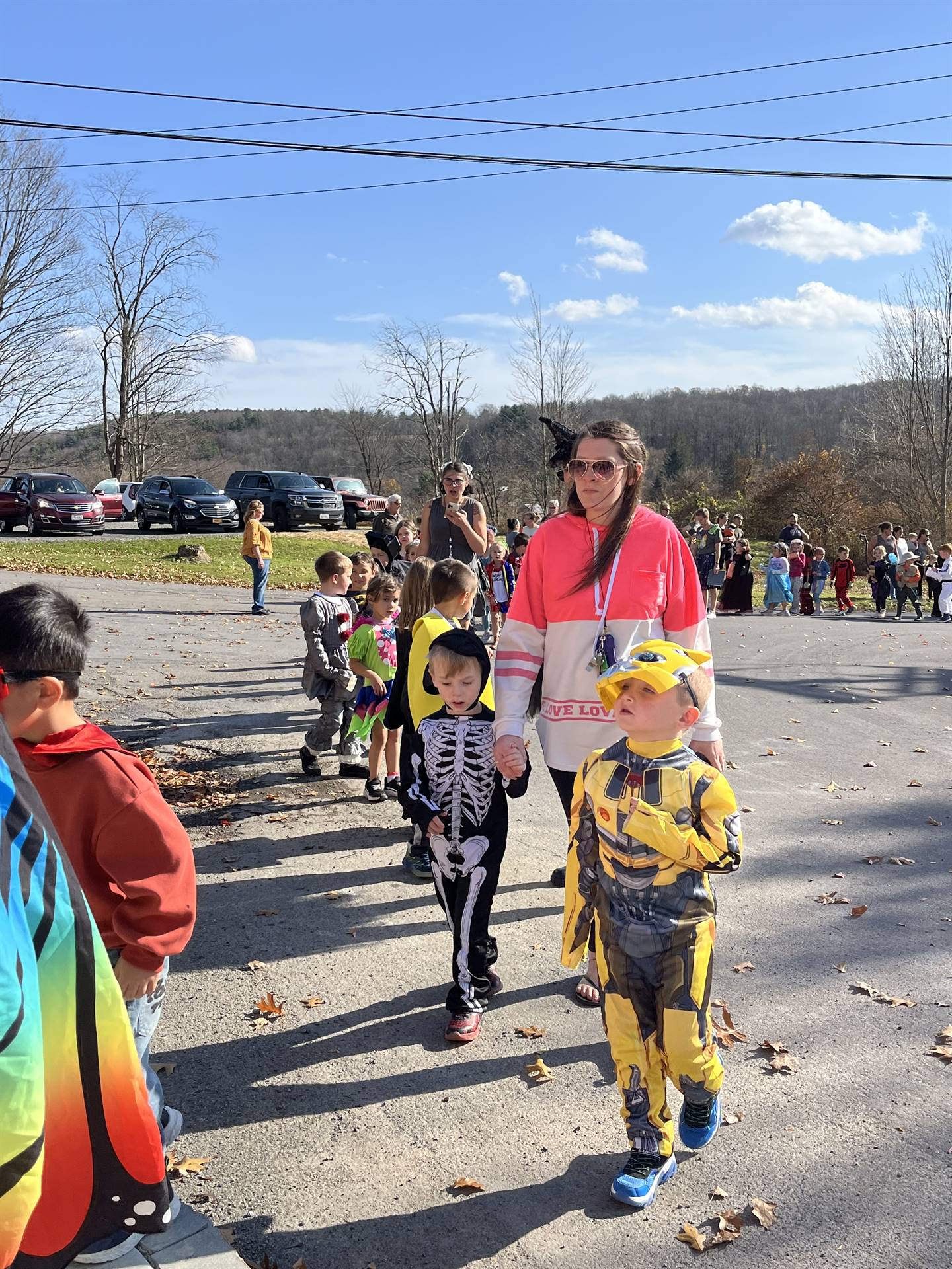 students marching in halloween parade outdoors!