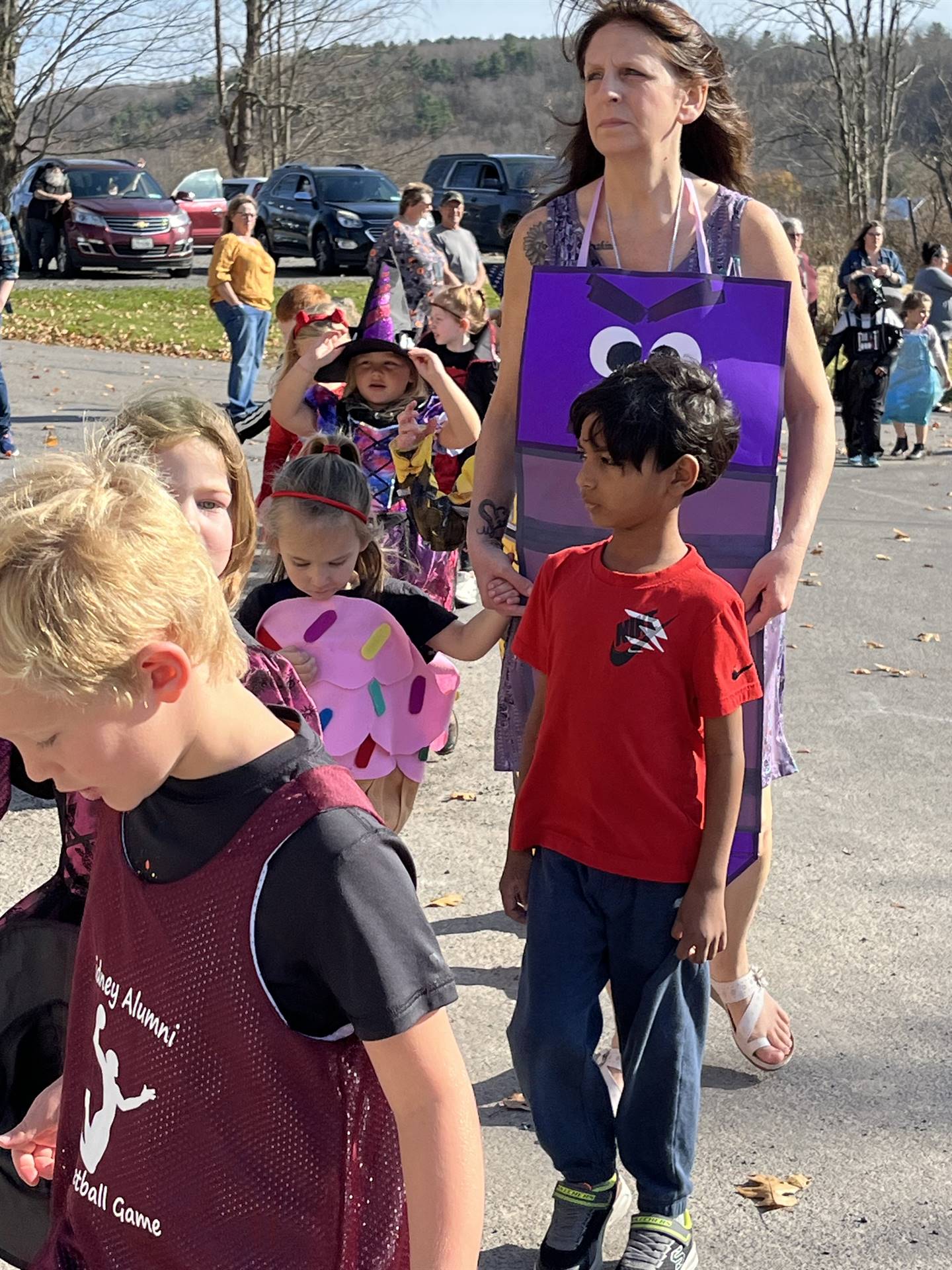 students marching in halloween parade outdoors!
