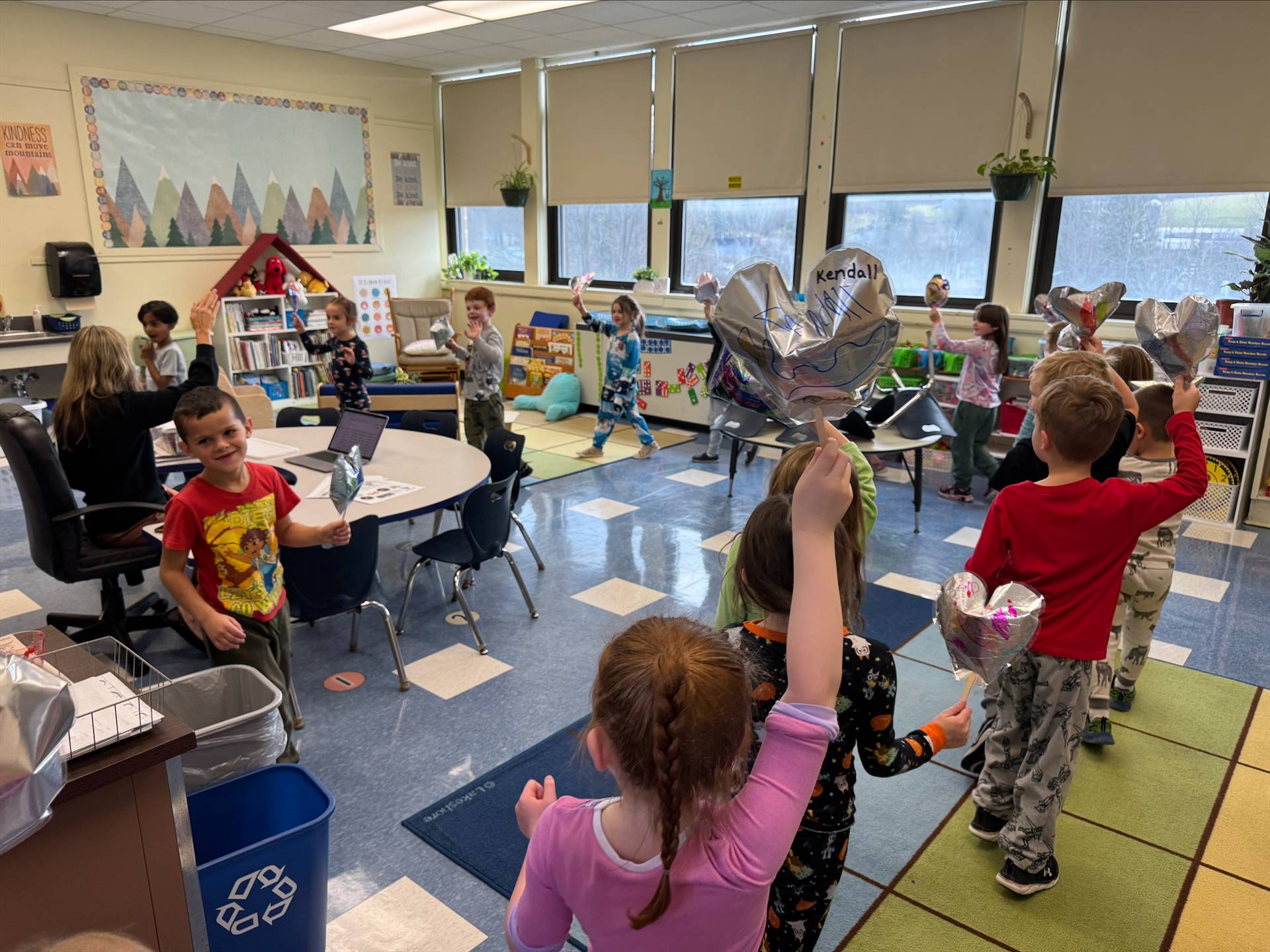 children reenacting a Macy's Day parade complete with balloons!