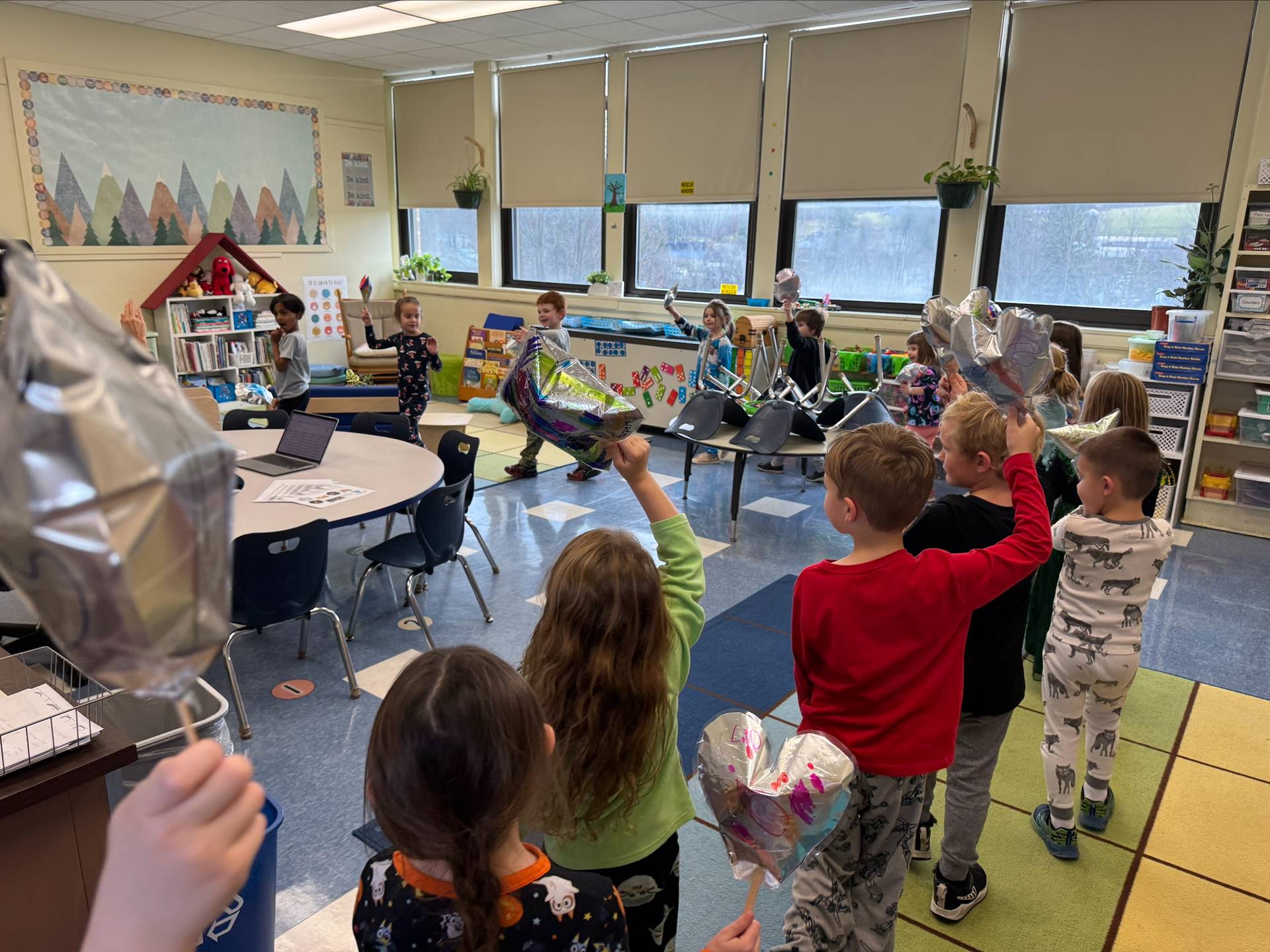 children reenacting a Macy's Day parade complete with balloons!