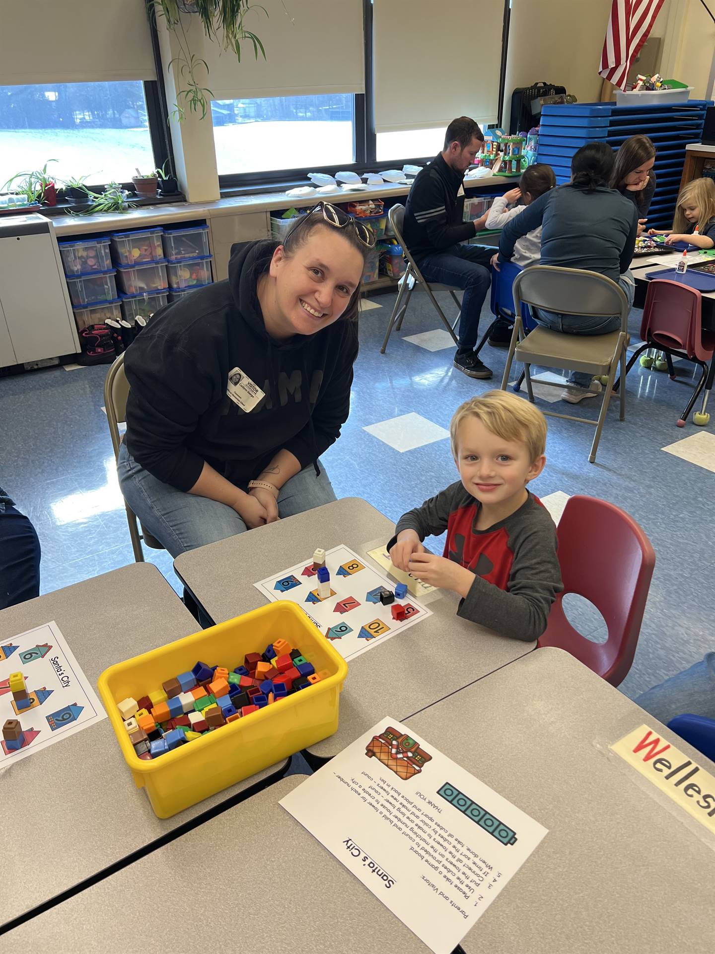 adult and student working together 