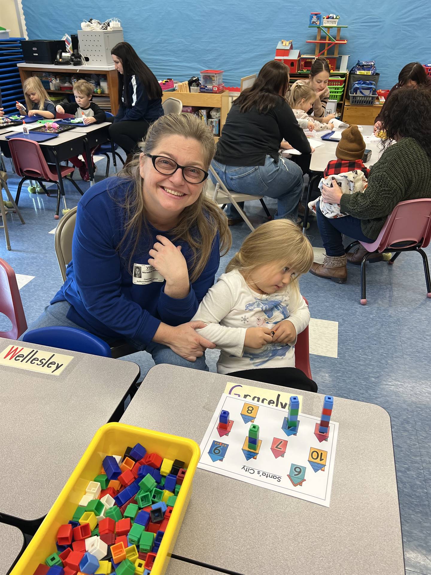 adult and student working together 
