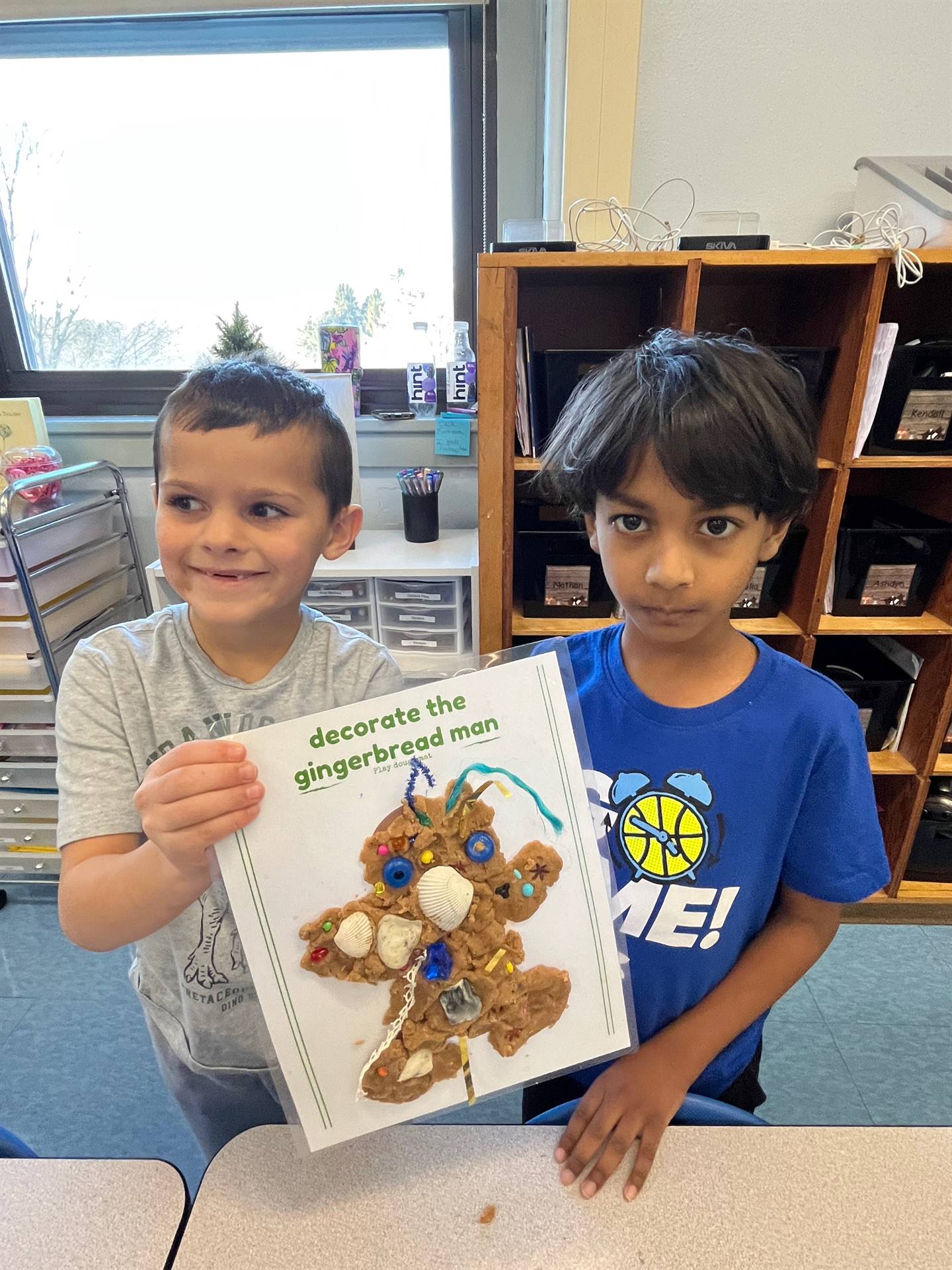 2 students worked together to create a play do ginger bread friend.