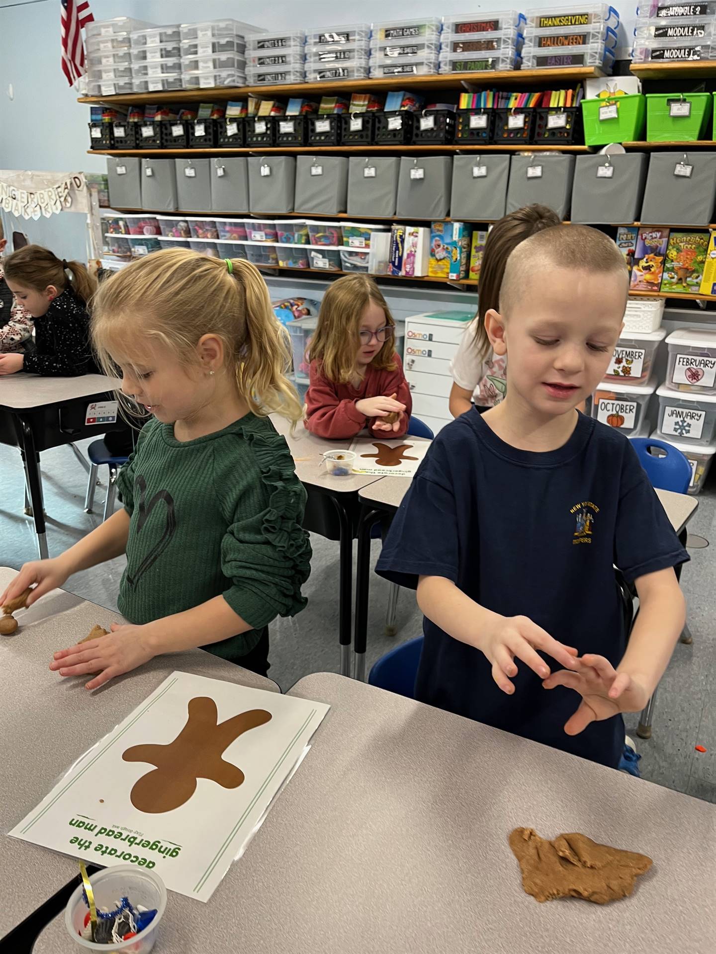 2 students worked together to create a play do ginger bread friend.