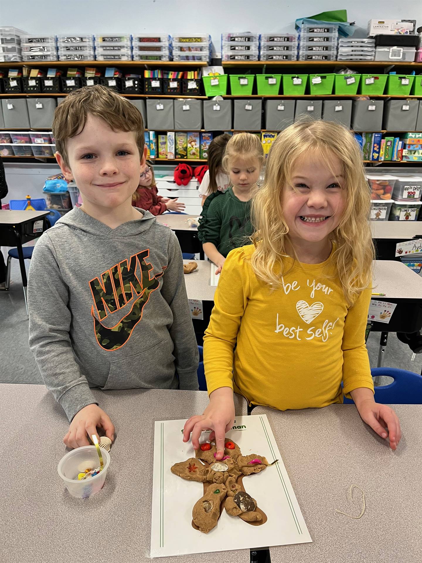 2 students worked together to create a play do ginger bread friend.