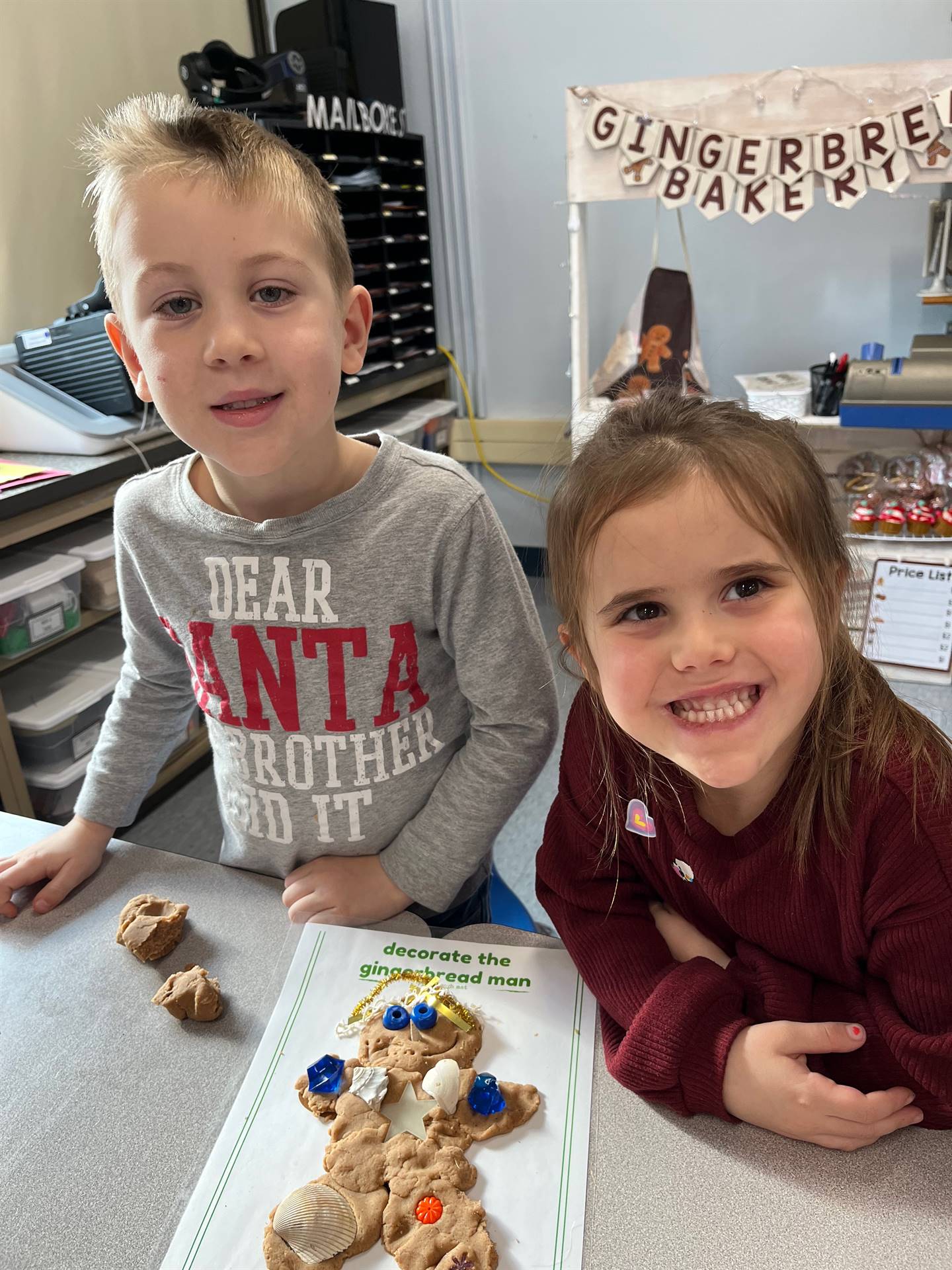 2 students worked together to create a play do ginger bread friend.