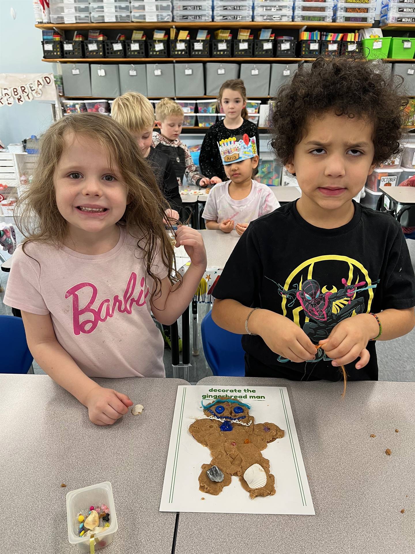 2 students worked together to create a play do ginger bread friend.