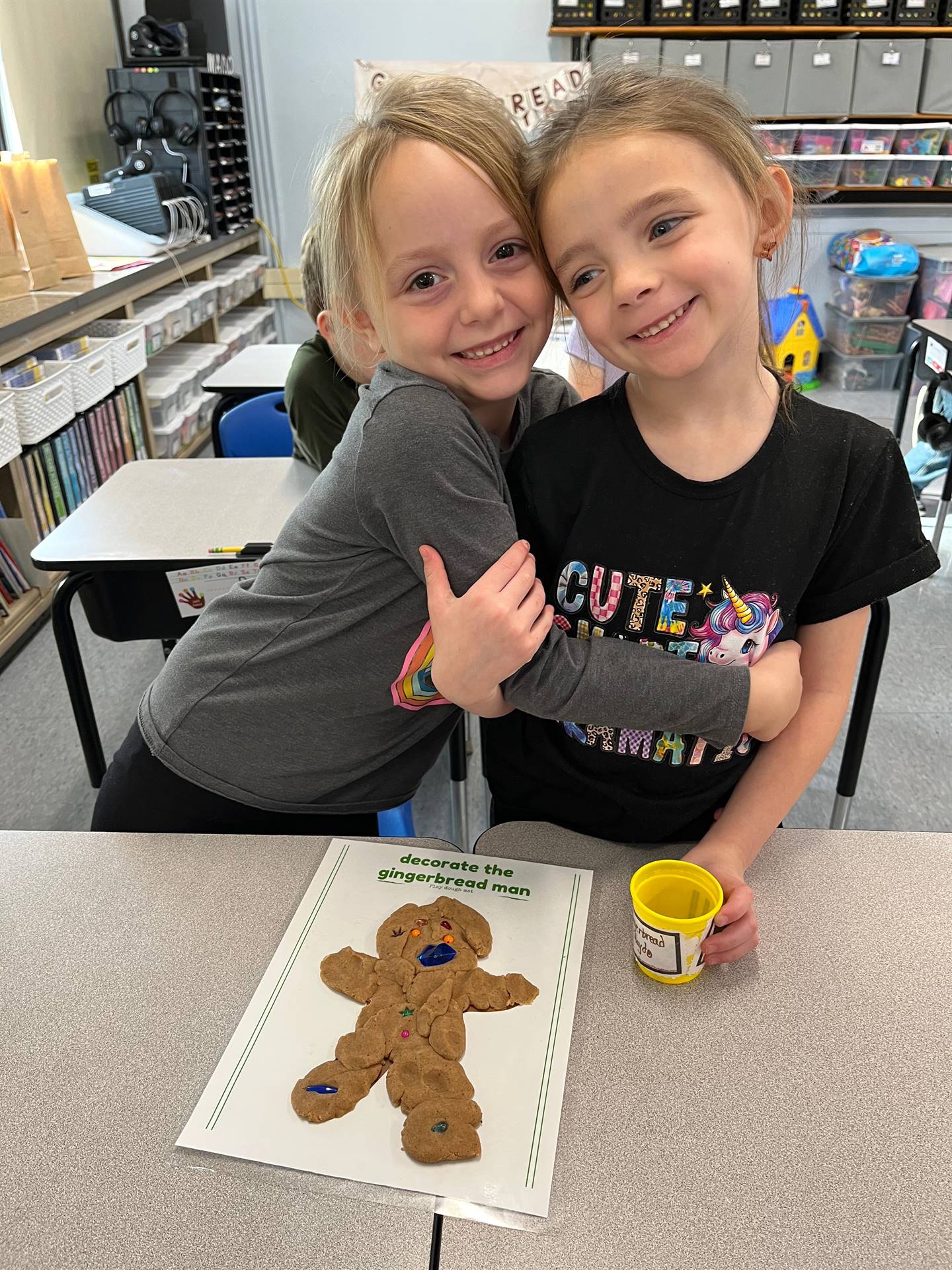 2 students worked together to create a play do ginger bread friend.