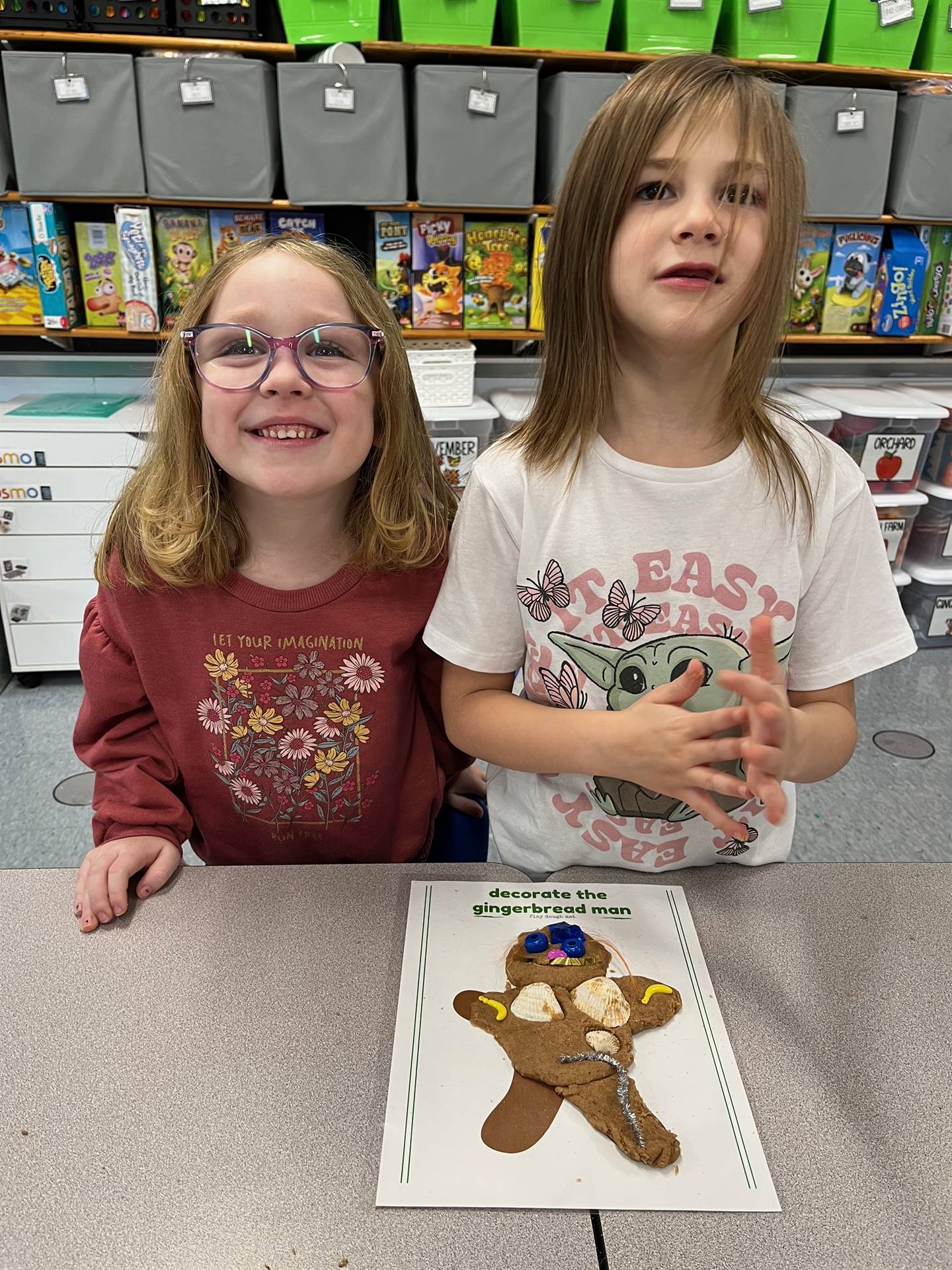 2 students worked together to create a play do ginger bread friend.
