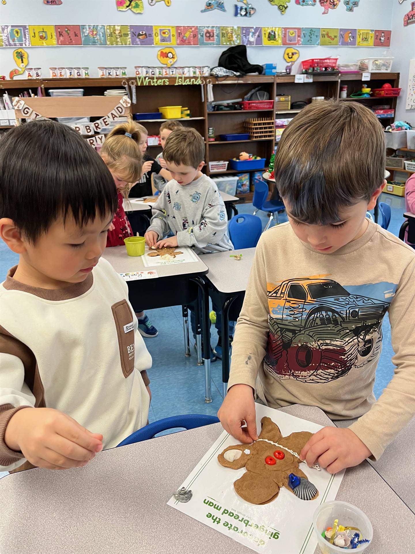 2 students worked together to create a play do ginger bread friend.