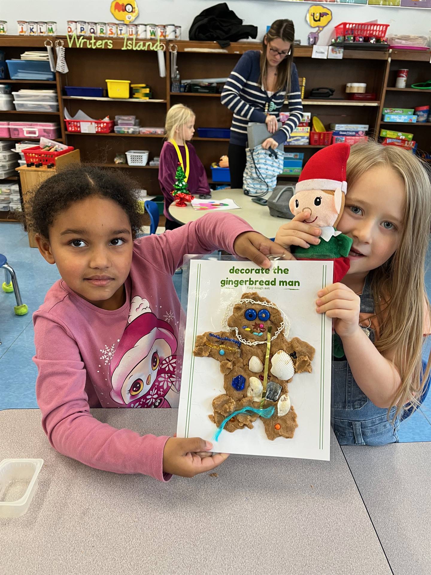 2 students worked together to create a play do ginger bread friend.