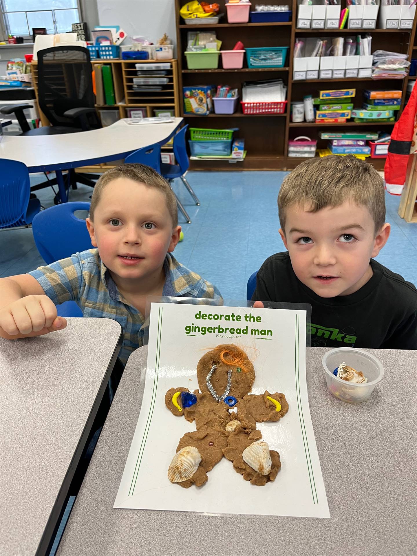 2 students worked together to create a play do ginger bread friend.2 students worked together to cre