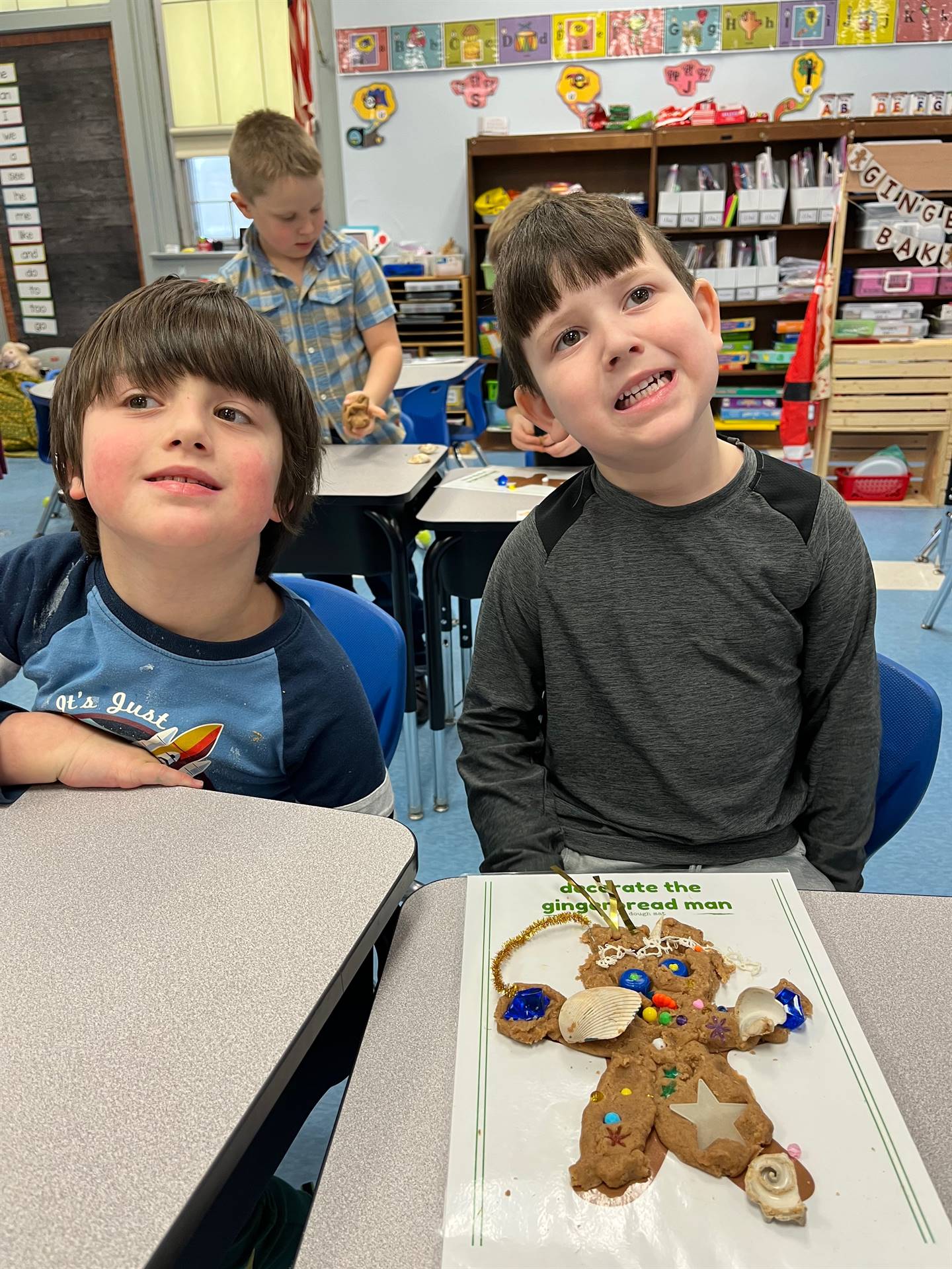 2 students worked together to create a play do ginger bread friend.