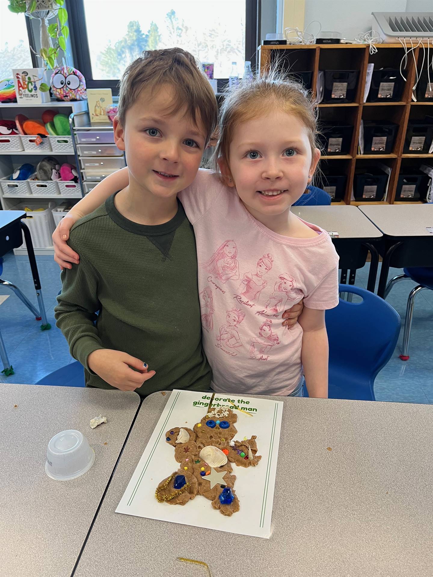 2 students worked together to create a play do ginger bread friend.