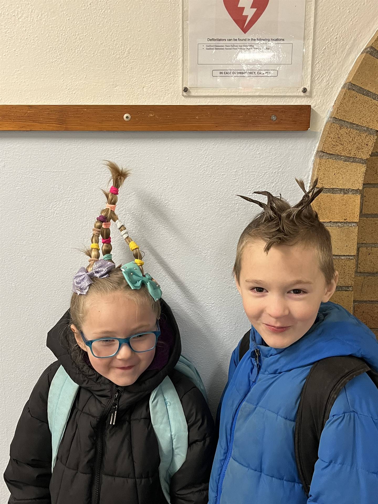 2 students with crazy hair