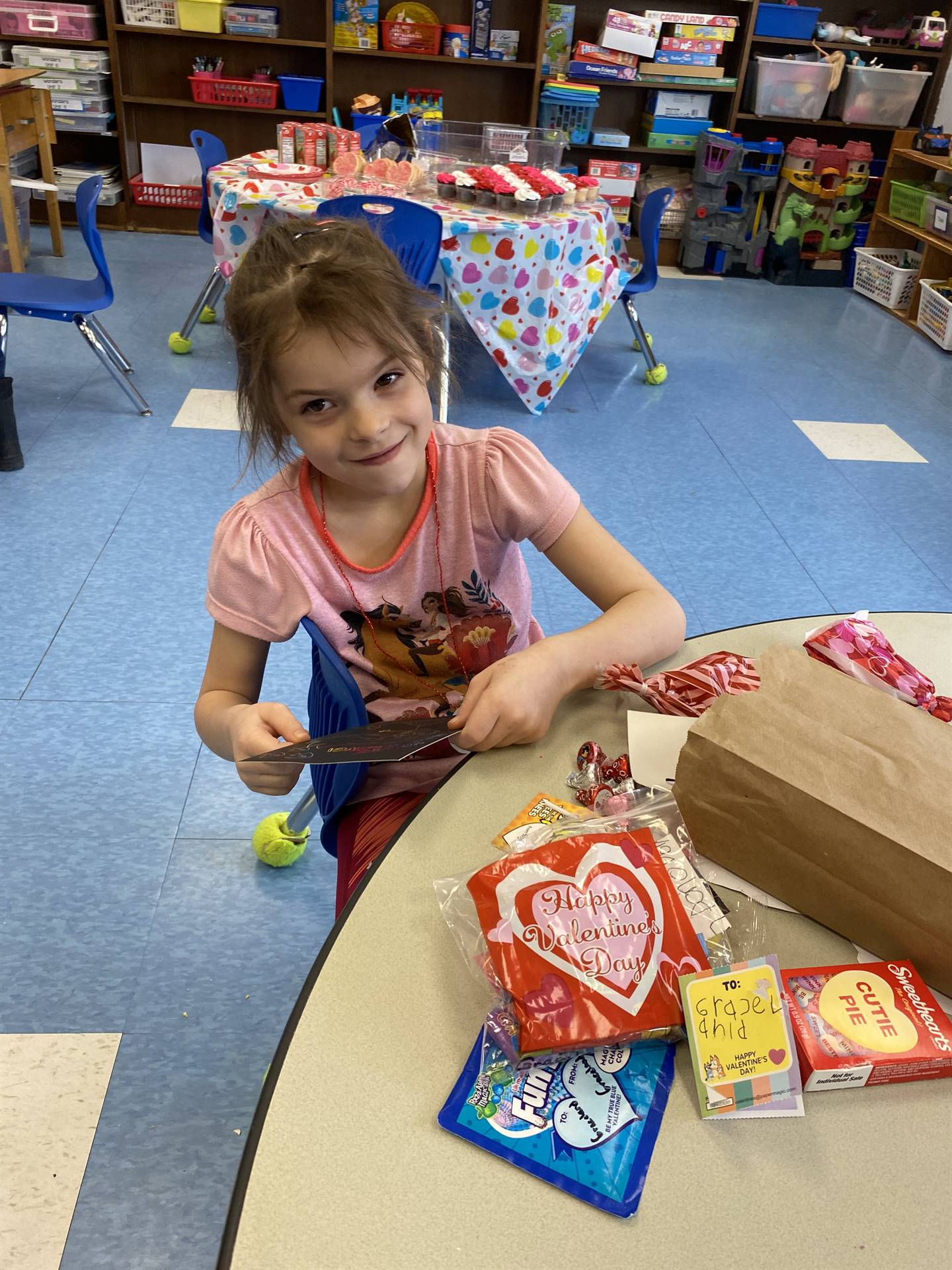 students go through their valentines with a  smile