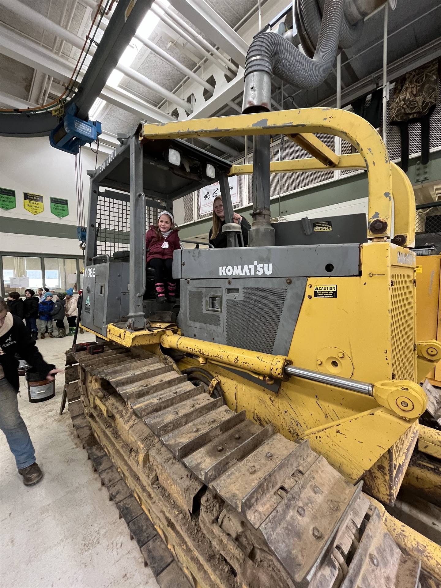 student on large digger