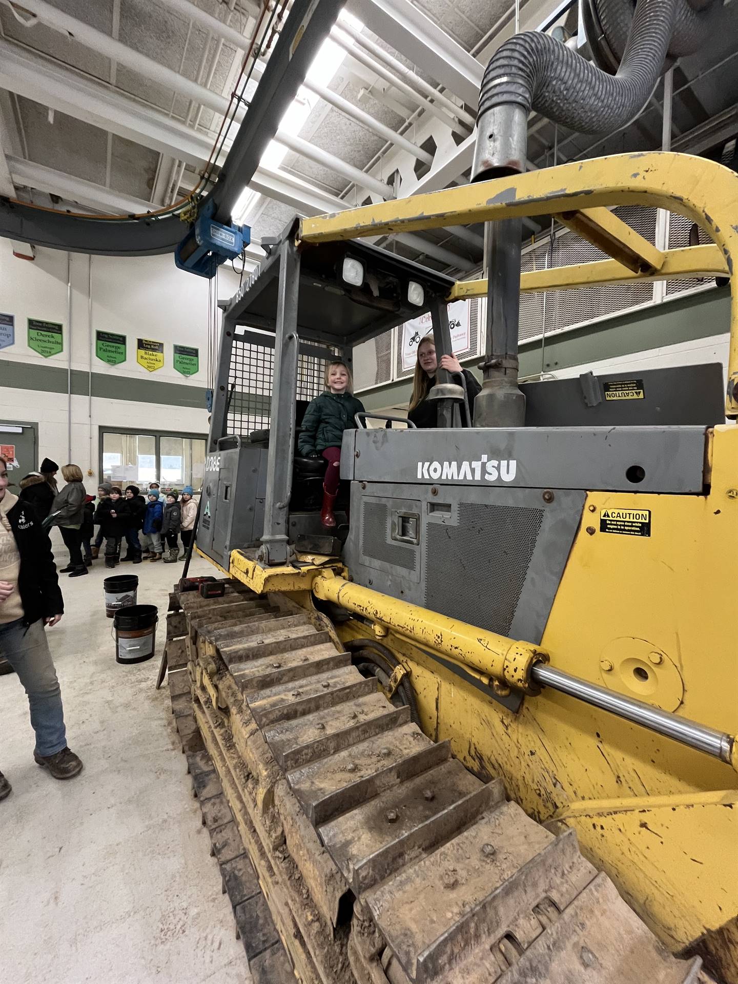 student on large digger