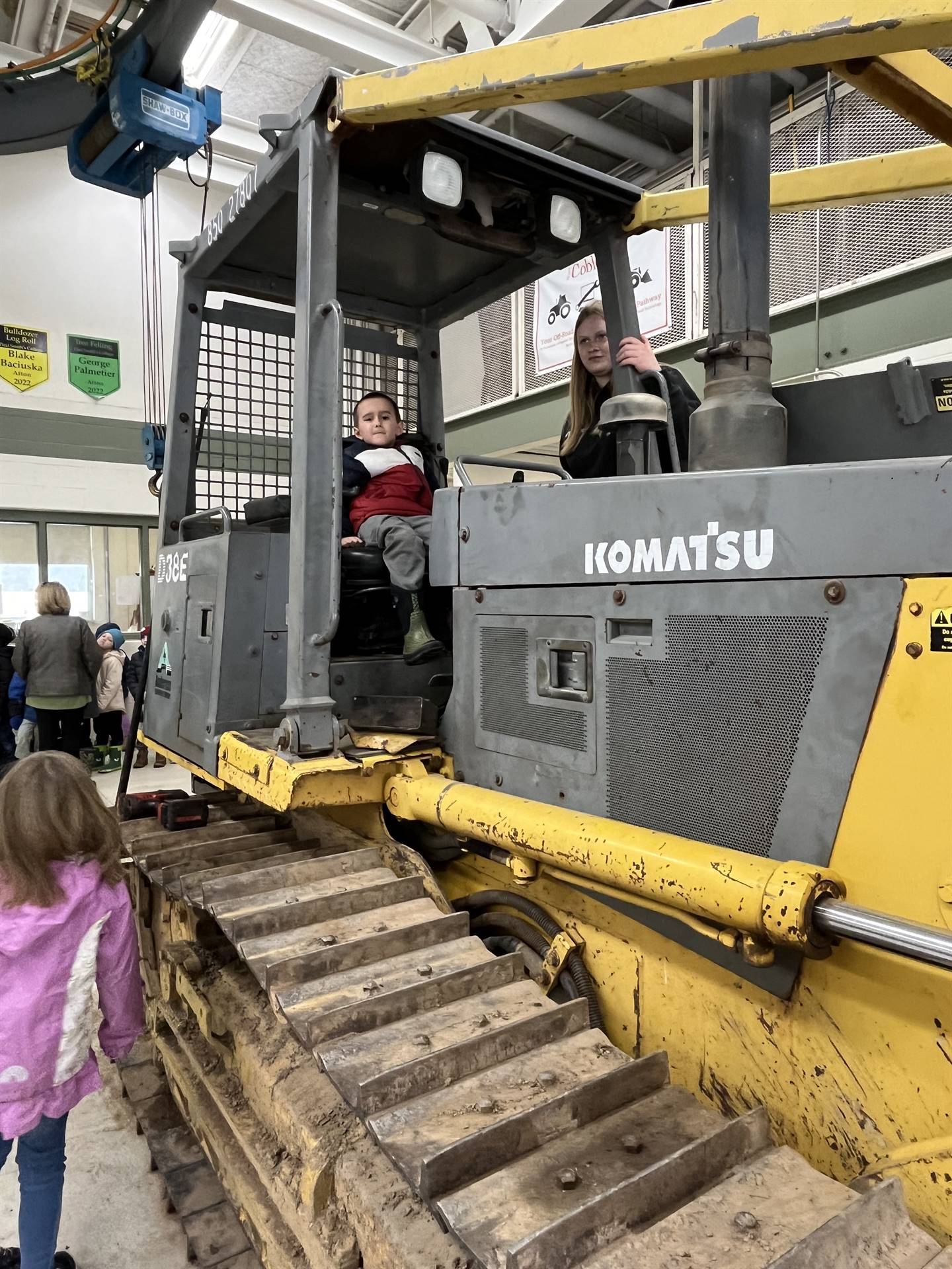 student on large digger