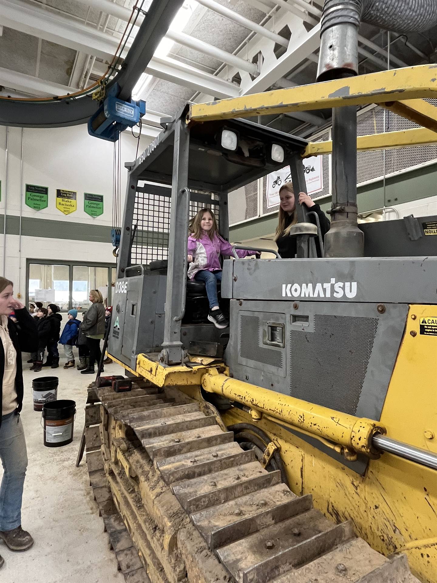 student on large digger