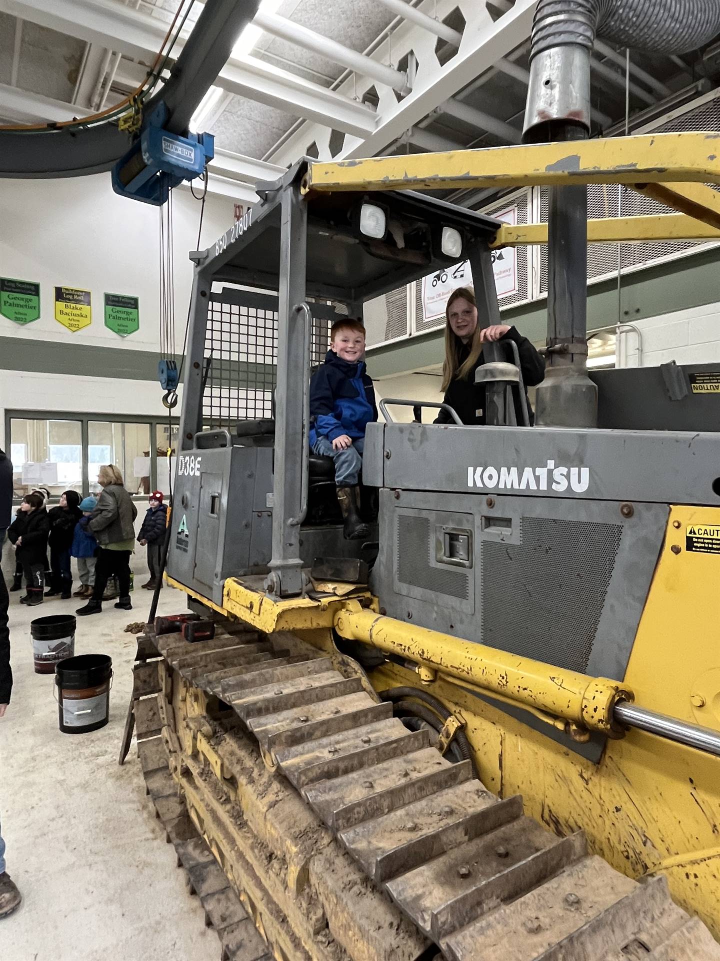 student on large digger