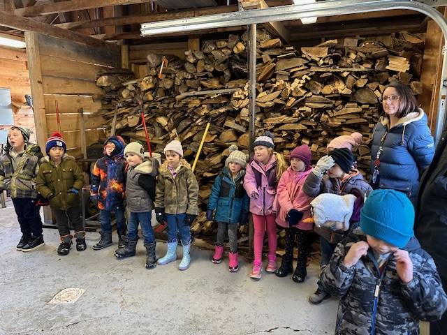 students with woodpile background