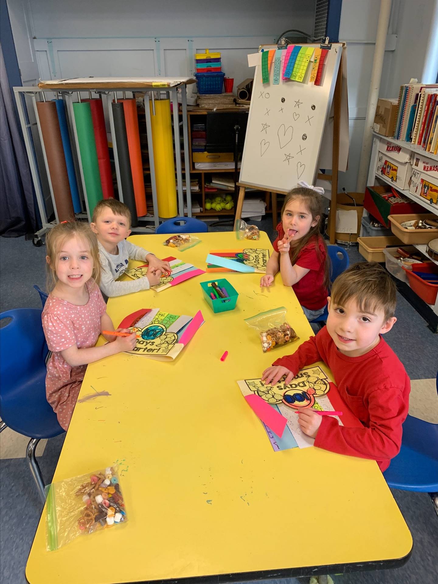 students do a craft at a table