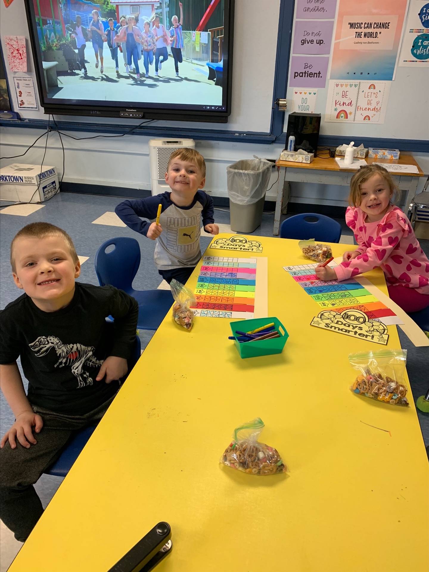 students do a craft at a table