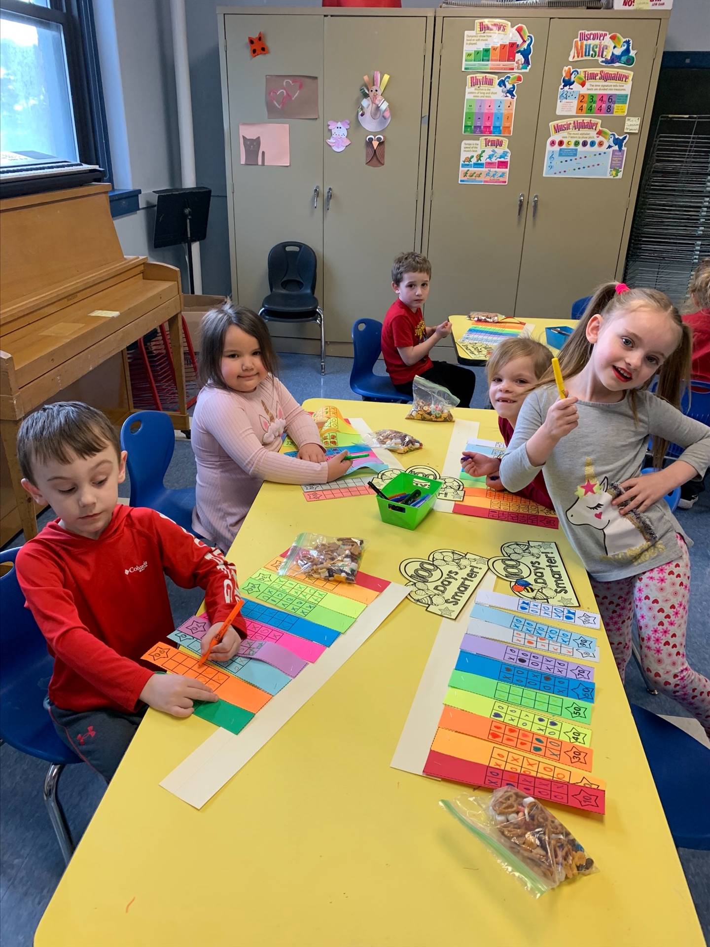 students do a craft at a table