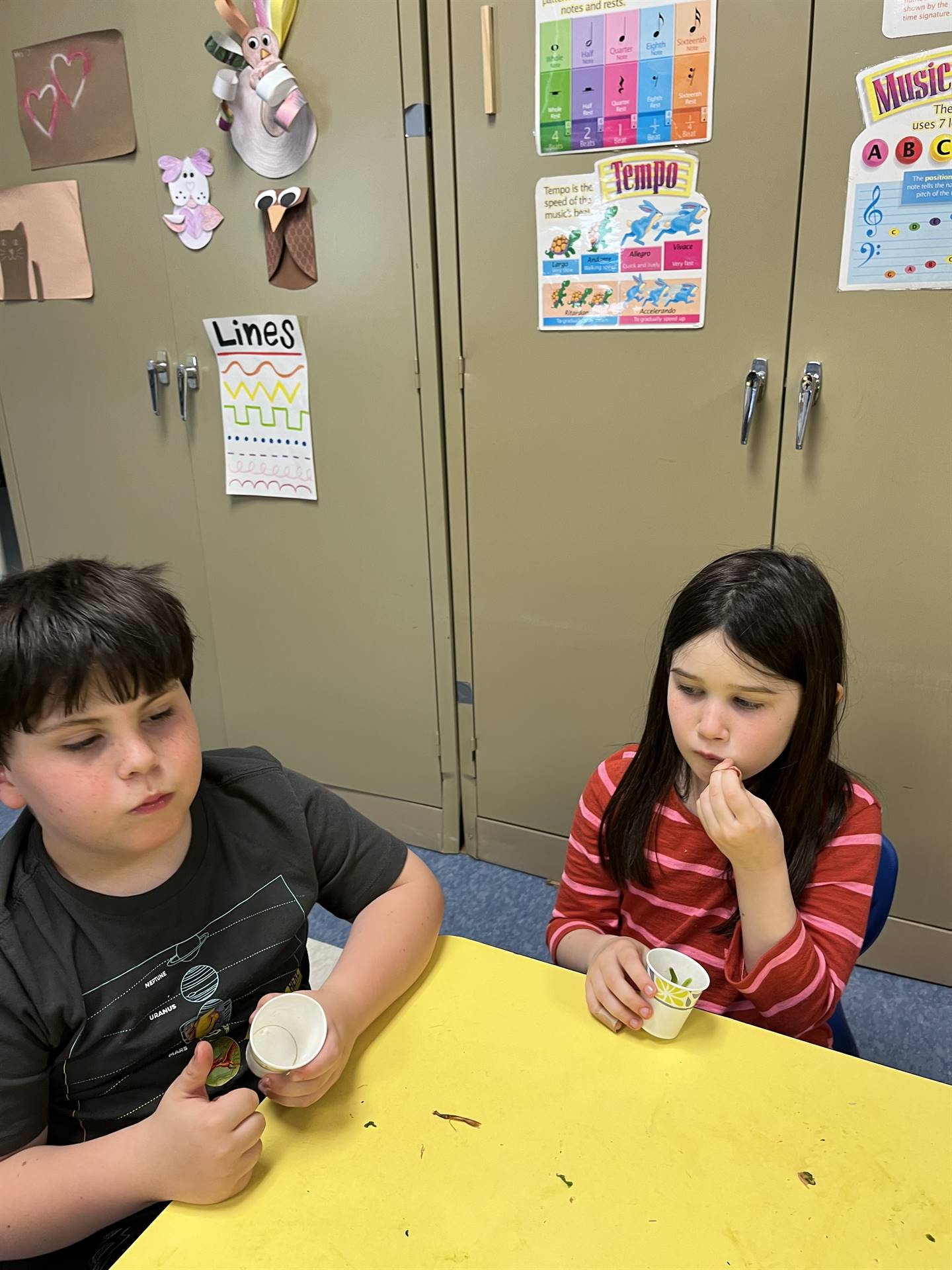 students try cooked greens.